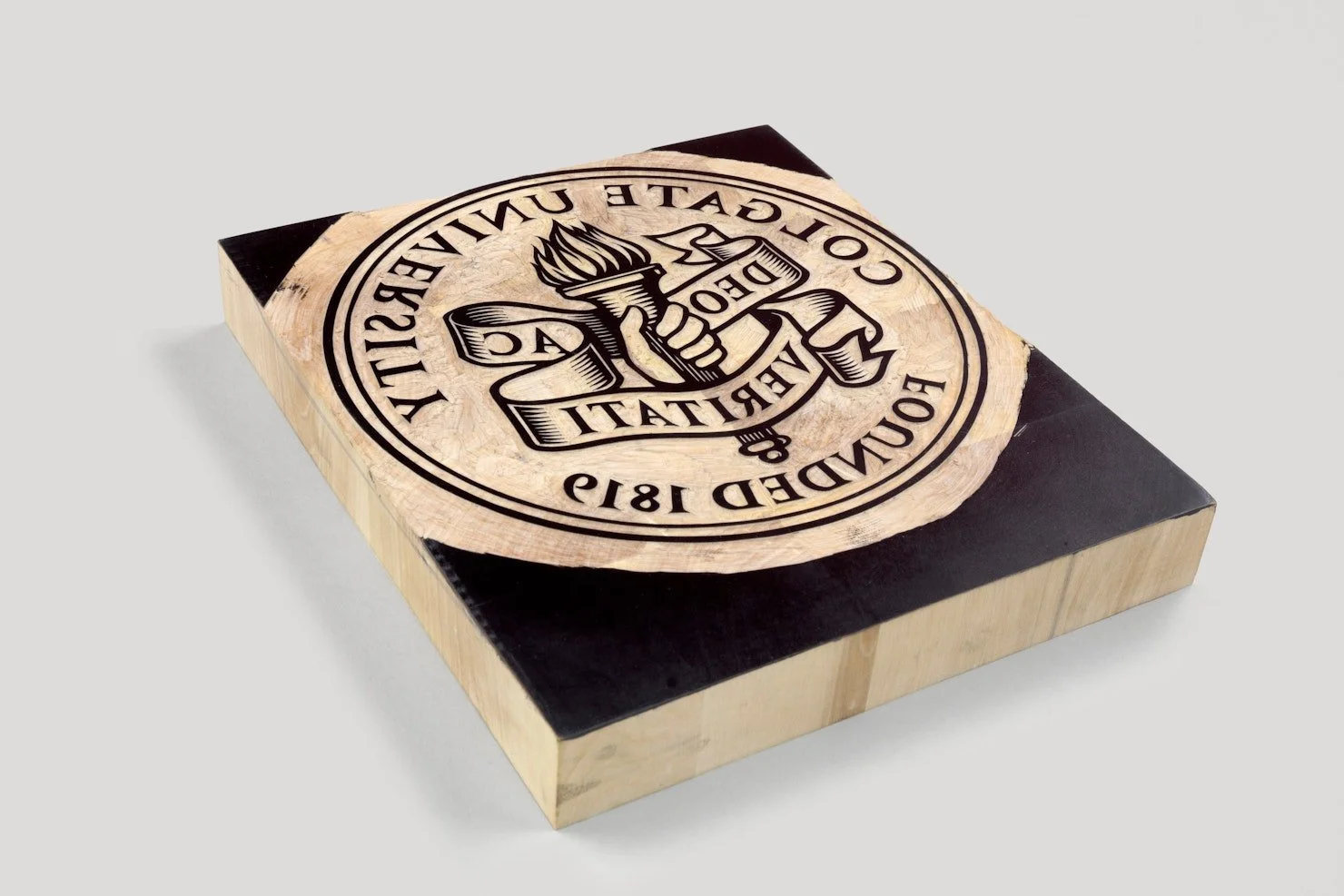 The University seal was remastered and hand-carved by printmaker, Christopher Wormell, affirming the craft-like nature of Colgate's intellectual heritage.
