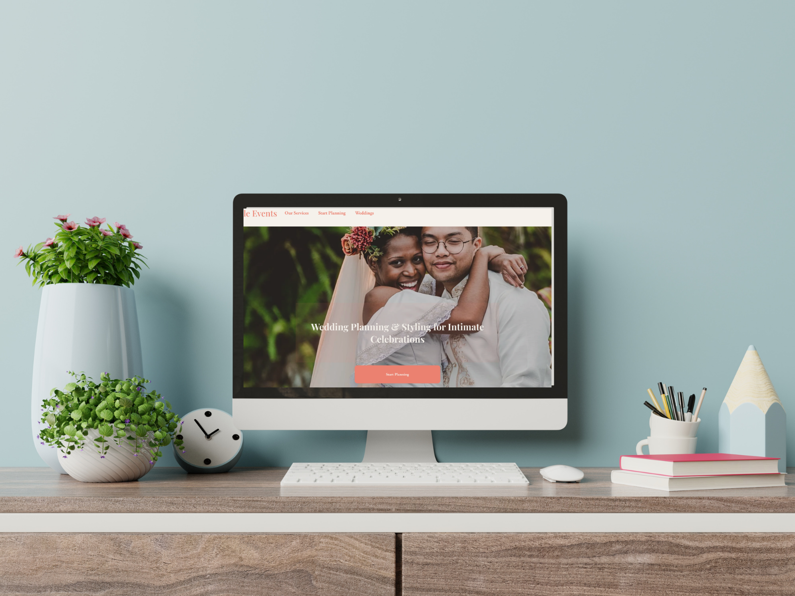 Wedding website design displayed on a desktop computer