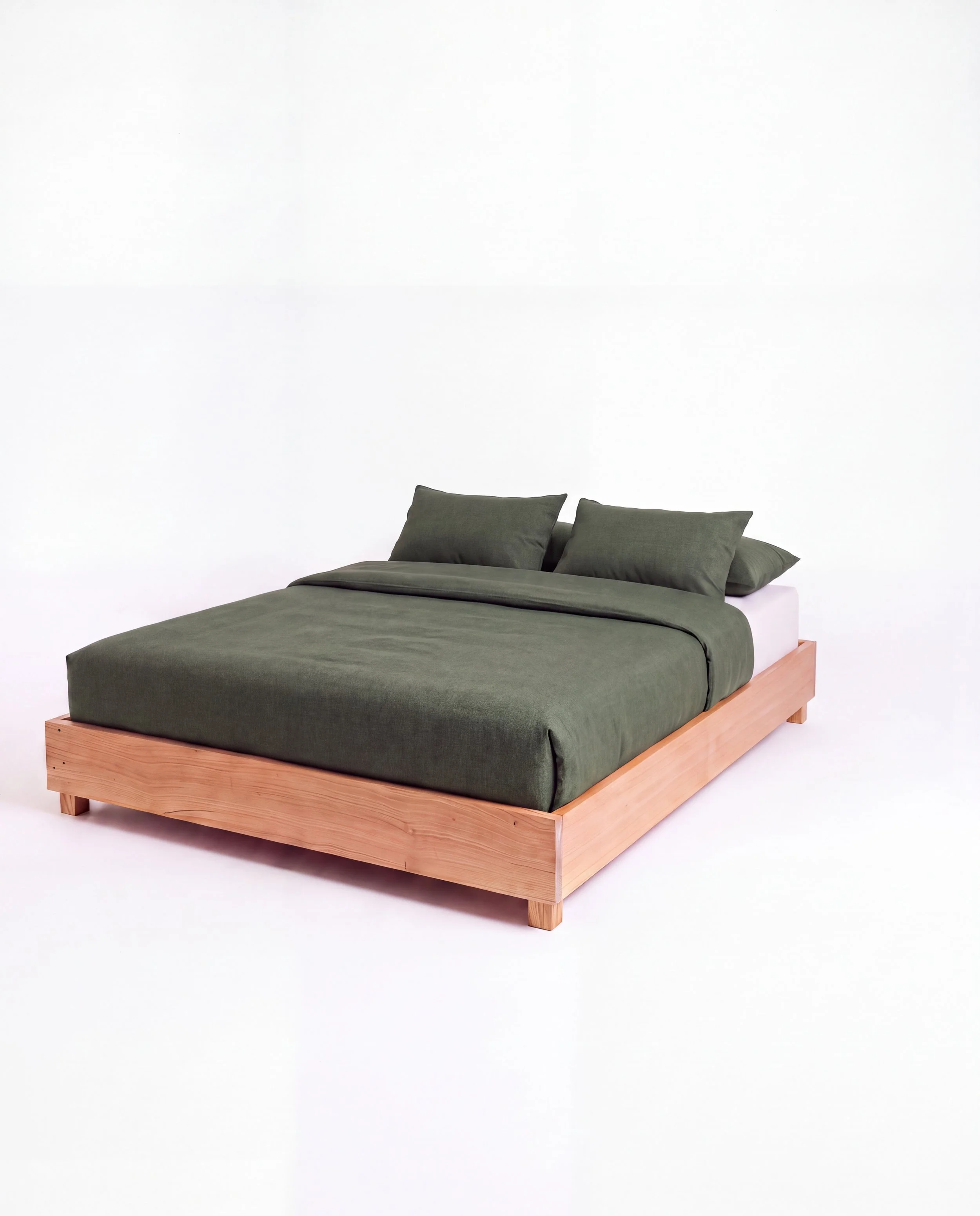 Solid timber platform bed with green bedding and led lights