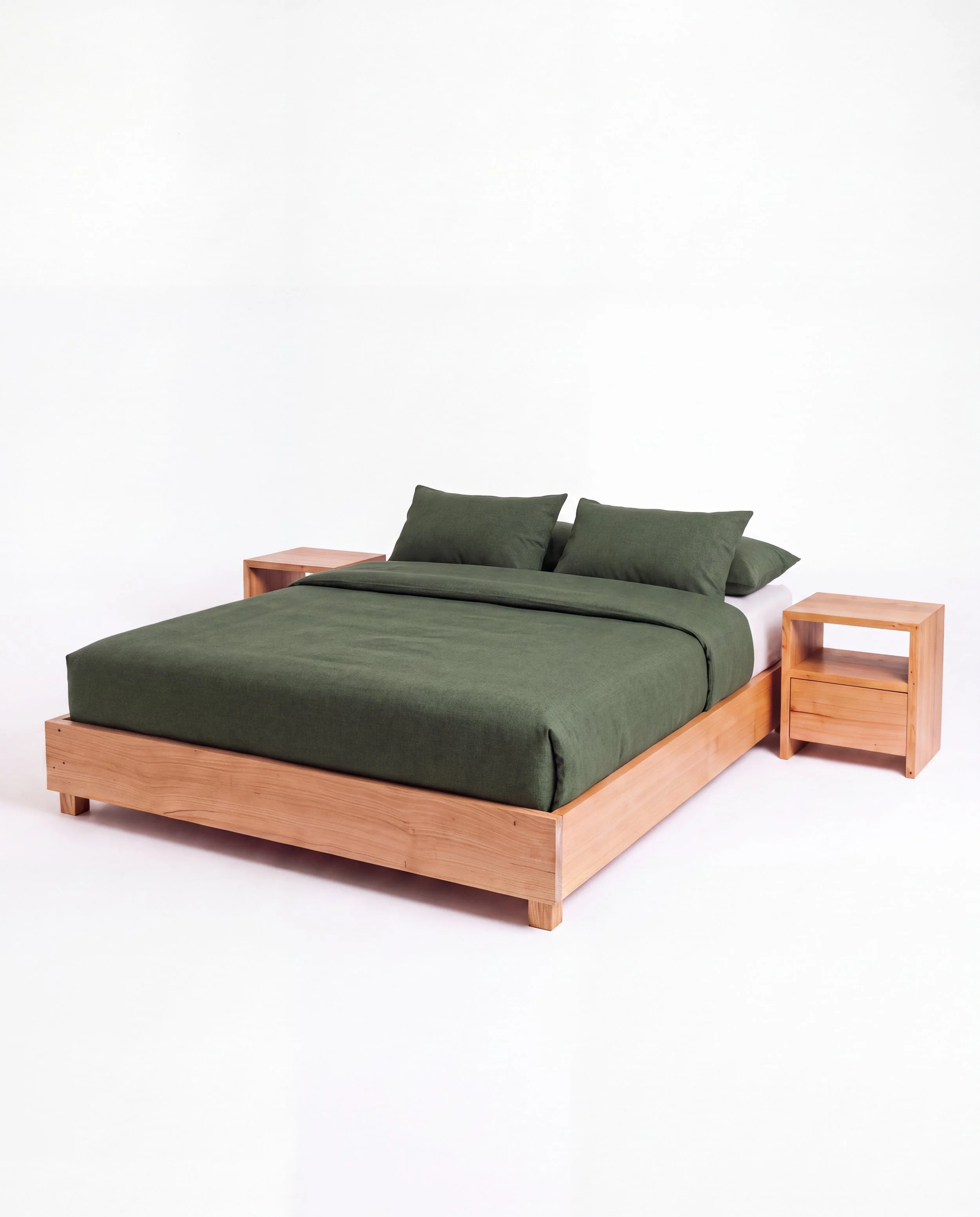 Solid timber platform bed with green bedding and led lights