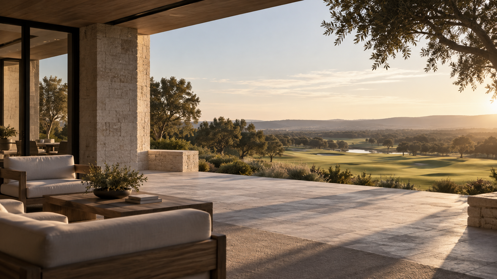 Private club terrace overlooking a golf course.