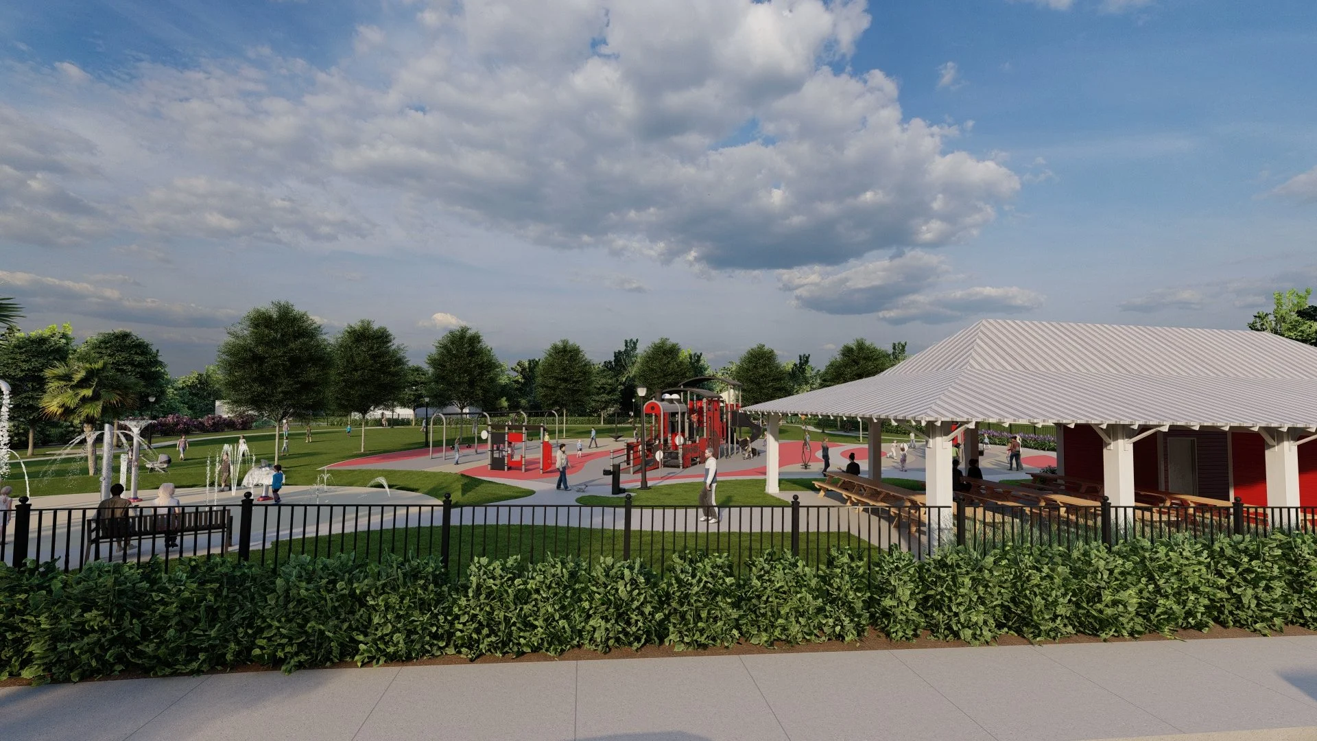Public park with playground, benches, trees, and a pavilion under a partly cloudy sky.