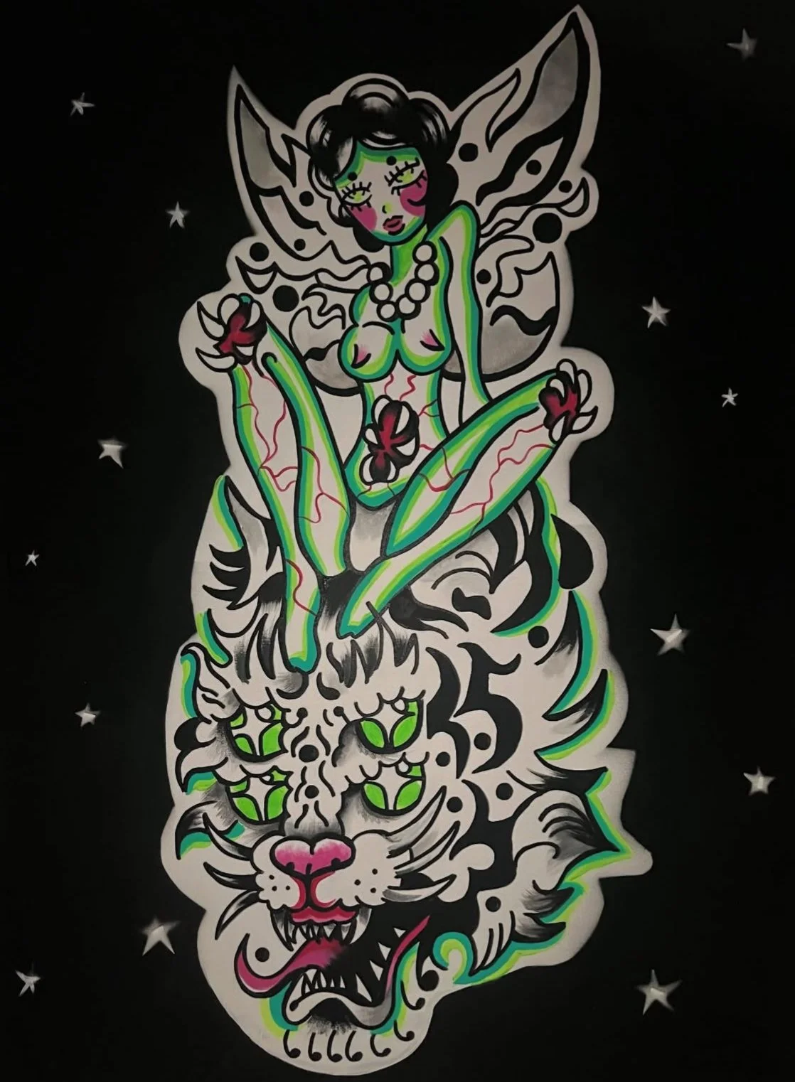 Street art illustration of a fairy-like woman with butterfly wings sitting on a stylized tiger face, set against a black background with small stars.