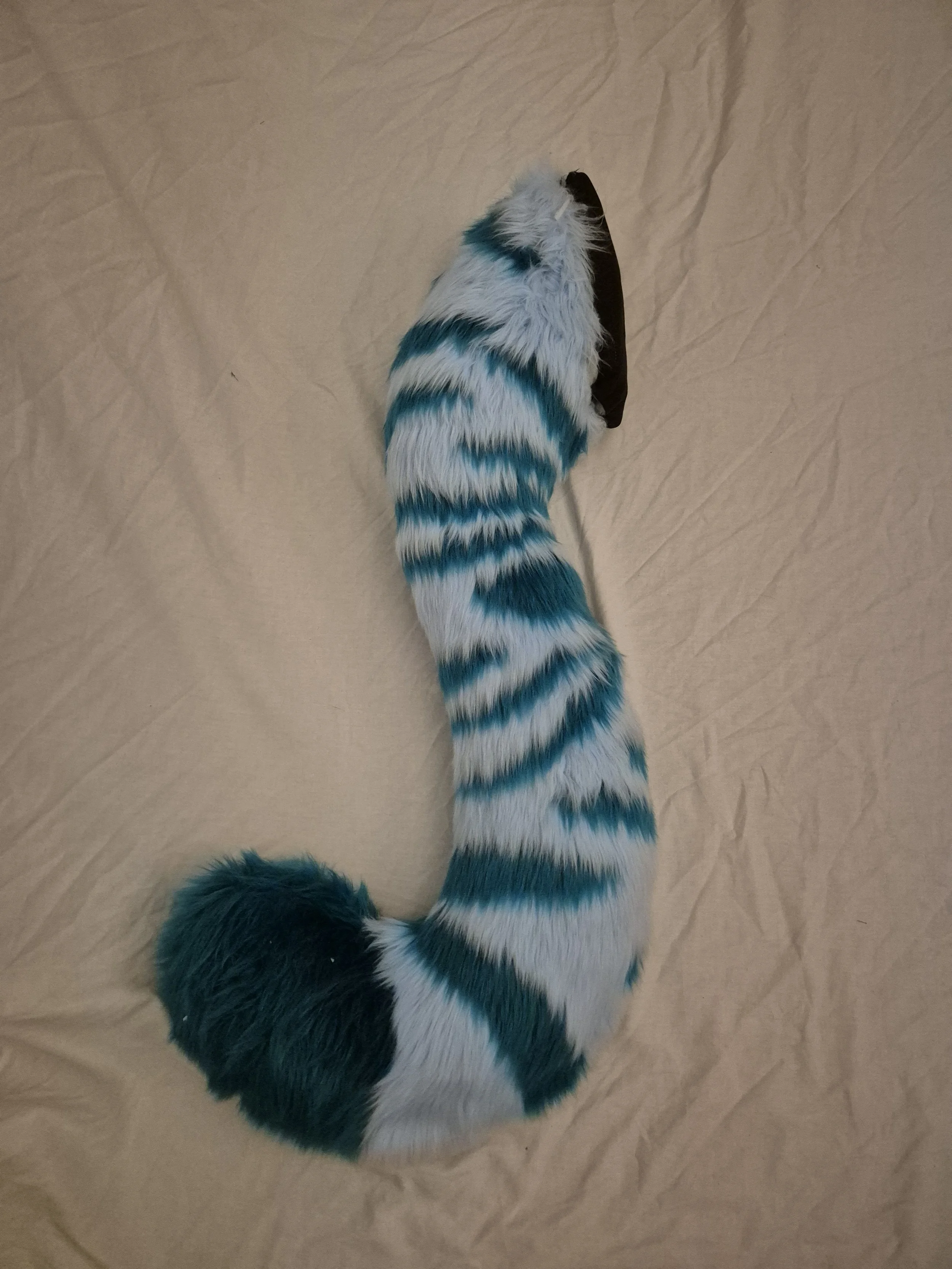 Skimble's tail, with hidden belt loops and full wagging function. 