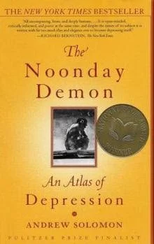 Book cover of The Noonday Demon: An Atlas of Depression by Andrew Solomon, featuring a gold medallion and a black-and-white photograph.
