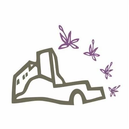 Illustration of a castle with three purple butterflies flying nearby.