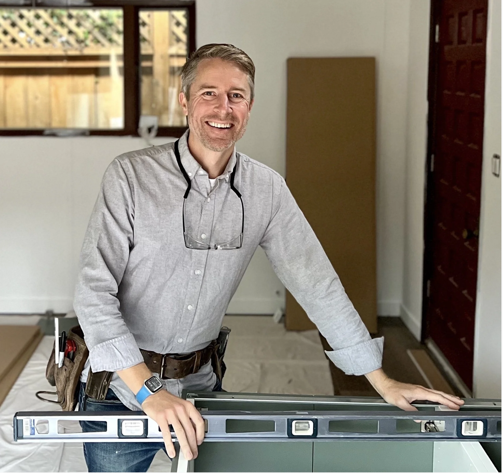 Christopher Brinker, general contractor and founder of RemodelCheck, reviewing residential remodeling project details.