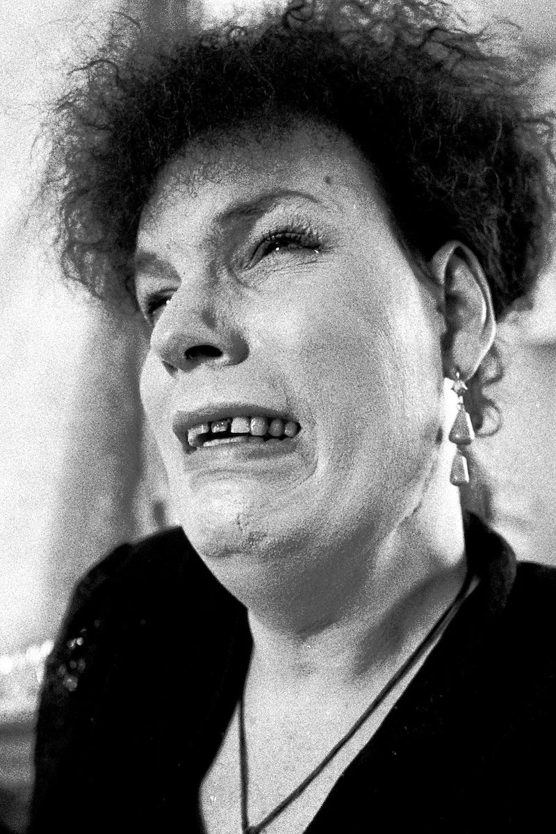 Sandie cries over rocky 2 2x2.jpg