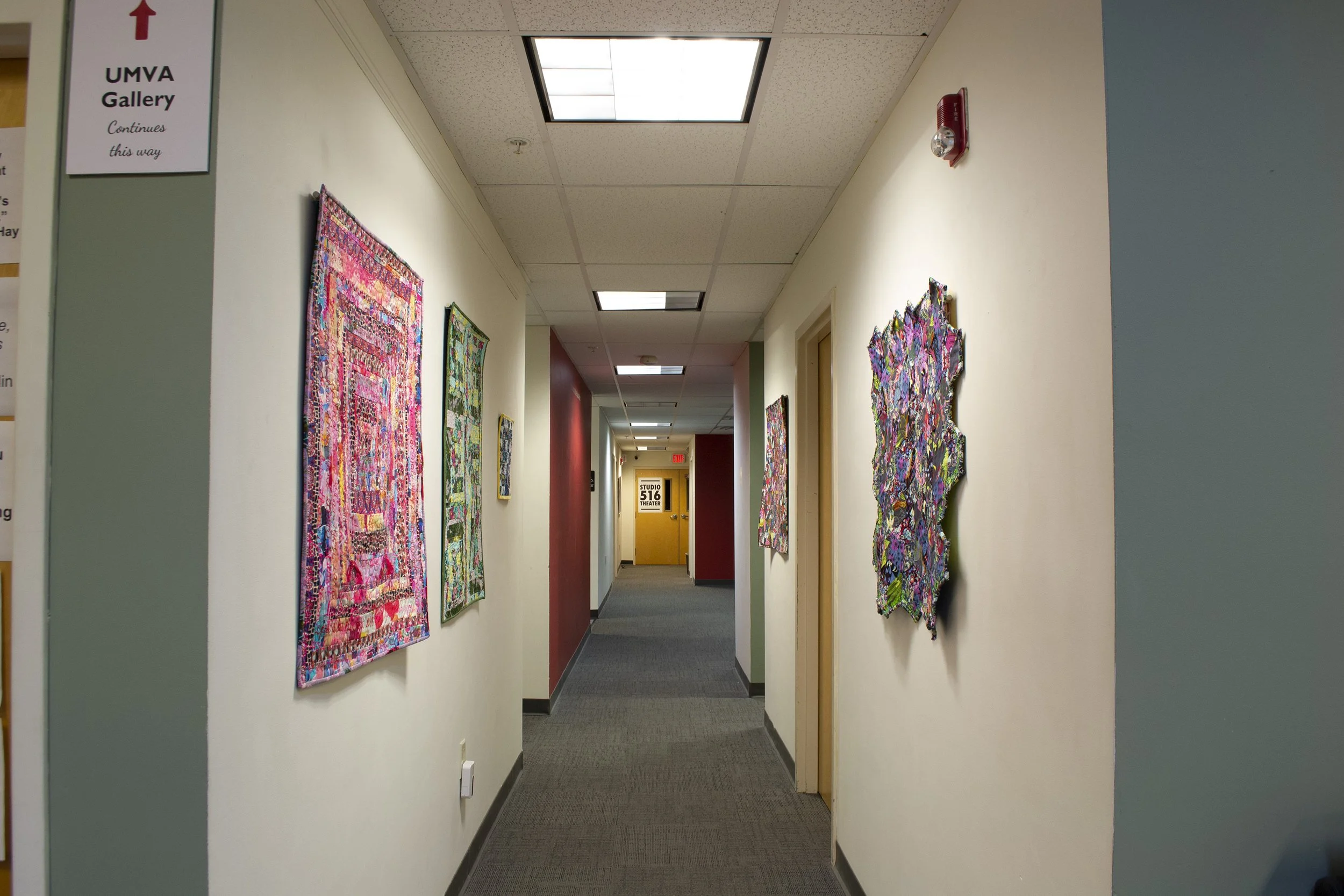 Installation view of hallway of art show "Polychroma"