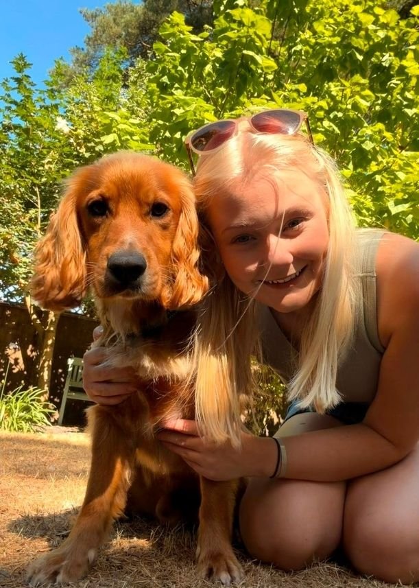 Charlie with Wesley, the dog behind Wesley & Friends Pet Care.