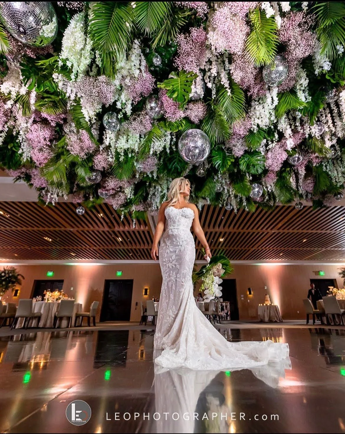 Floral ceiling installation with disco ball accents in Southwest Florida