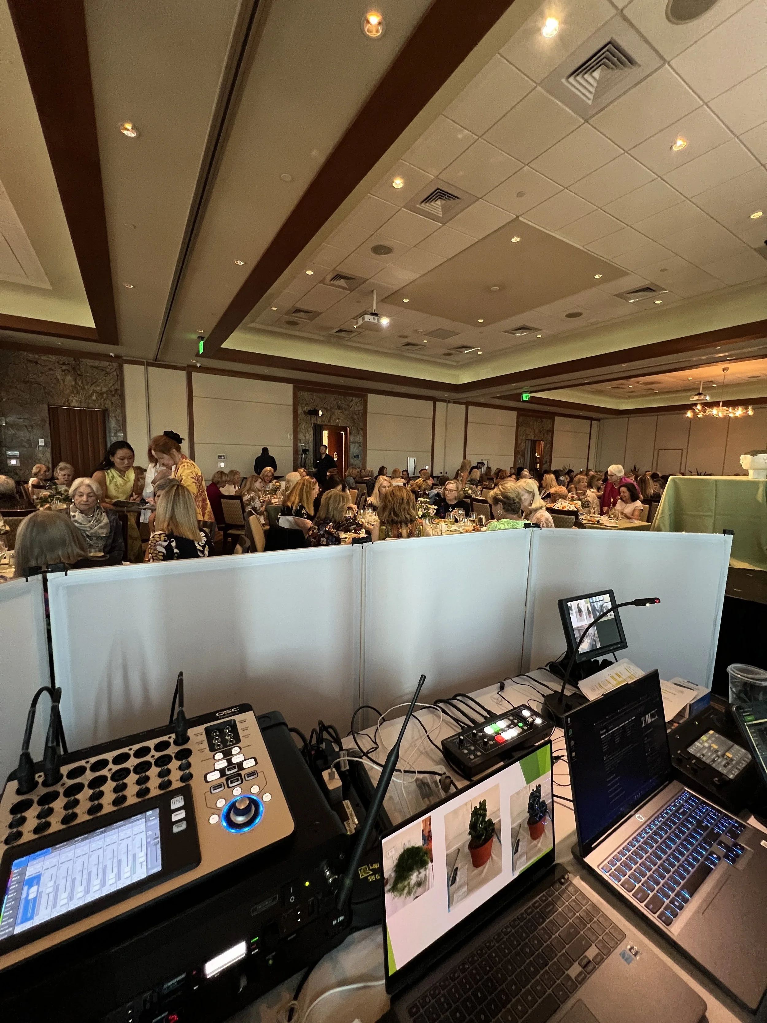 Sound mixing booth and control equipment set up at a ballroom event in Southwest Florida