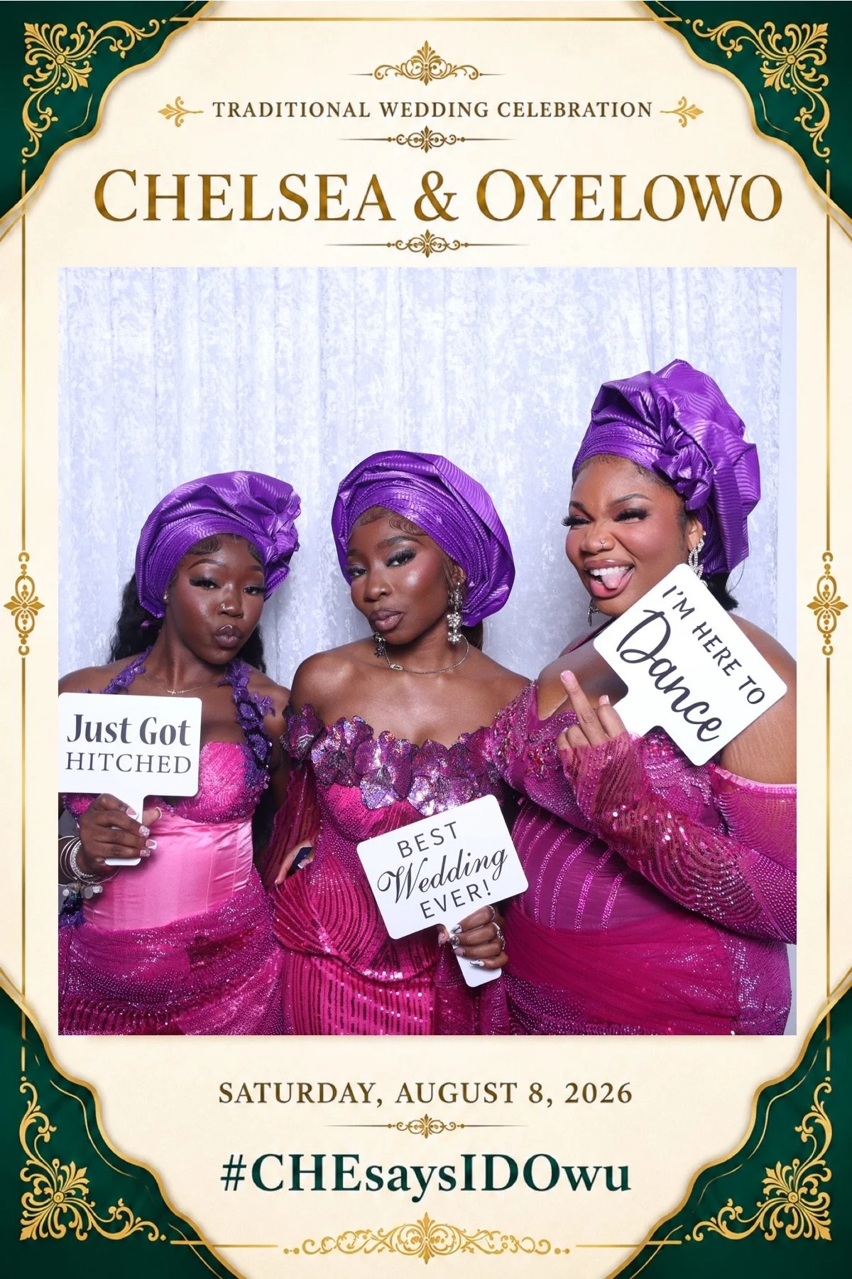 Three women dressed in purple traditional wedding attire with matching head wraps, holding signs that read 'Just got hitched,' 'Best wedding ever!,' and 'I'm here to dance,' posing in front of a white textured backdrop at a wedding celebration.