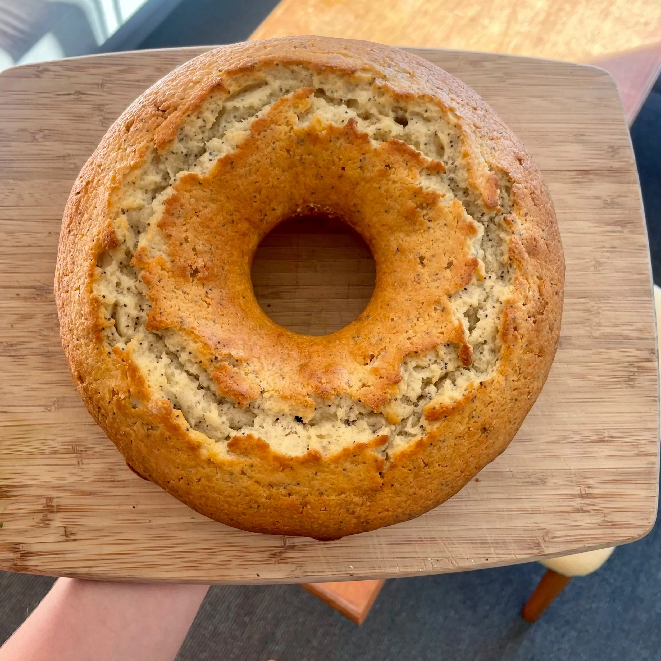 Golden ring cake on a wooden board, homemade dessert from a Revelstoke private chef.