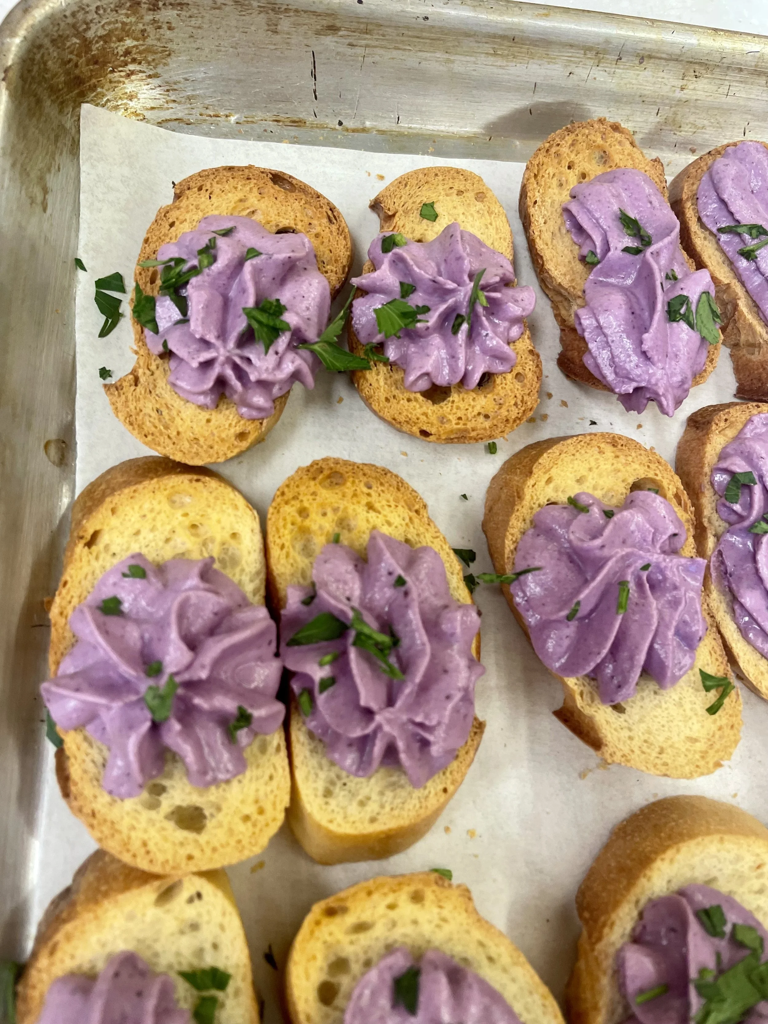 Crostini with herbed cheese, party appetizers by a Revelstoke catering chef.