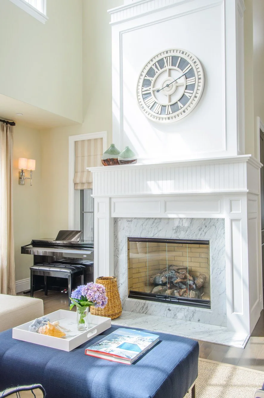 025-capecod-living-room---marble-fireplace.jpg