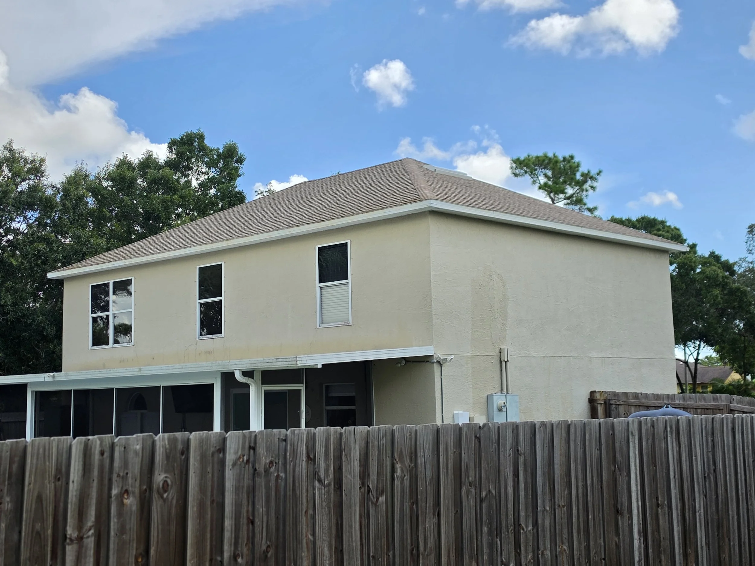 Roof after professional soft washing by Station 321 in Palm Bay Florida
