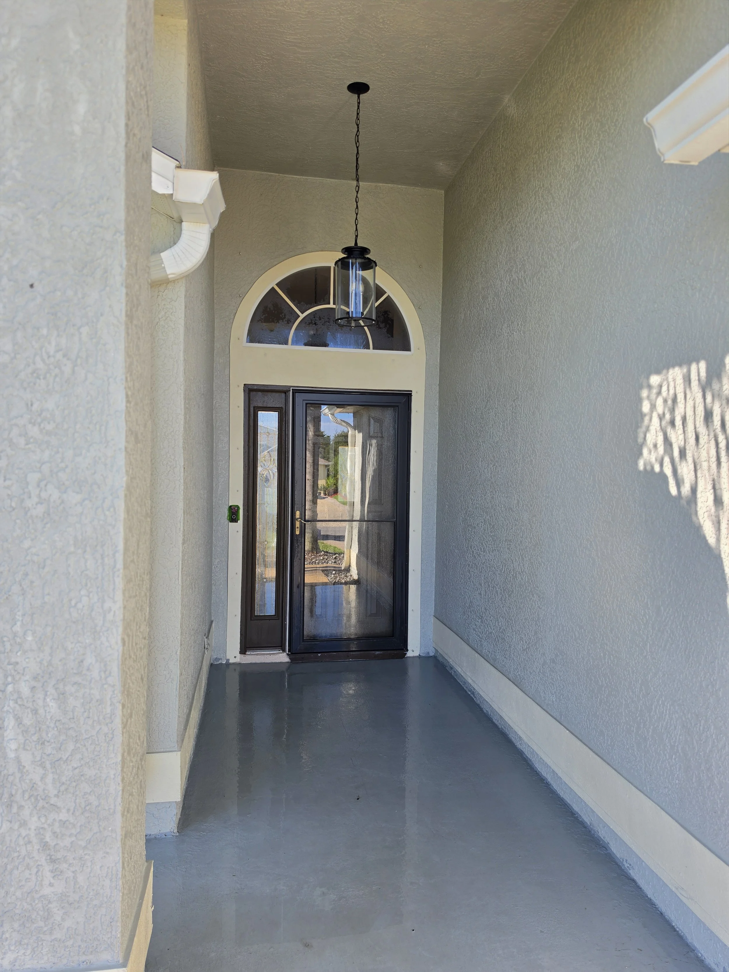 Melbourne Florida porch after professional soft washing by Station 321