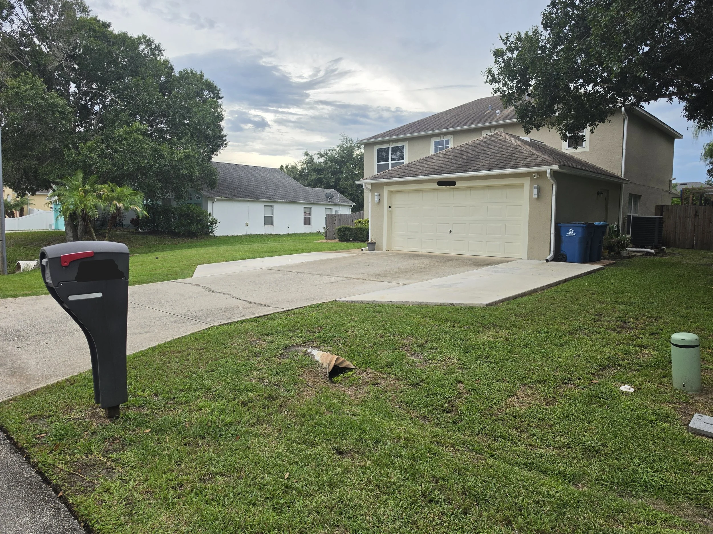 Palm Bay driveway before pressure washing