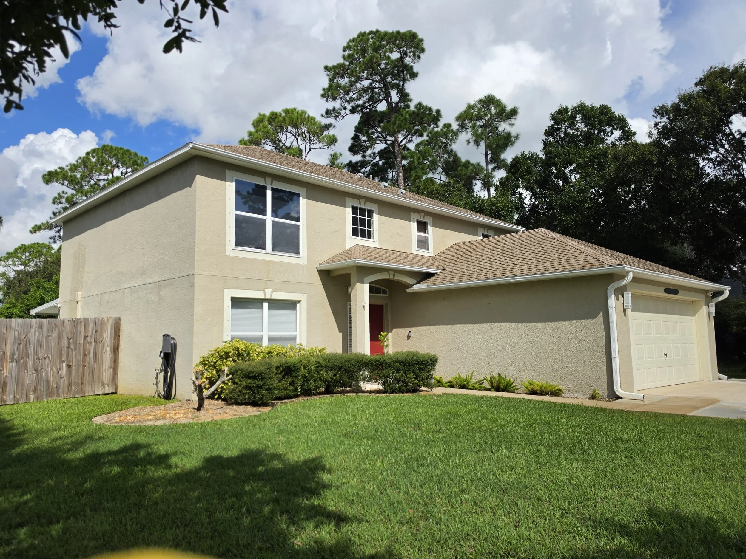 Roof after professional soft washing by Station 321 in Palm Bay Florida