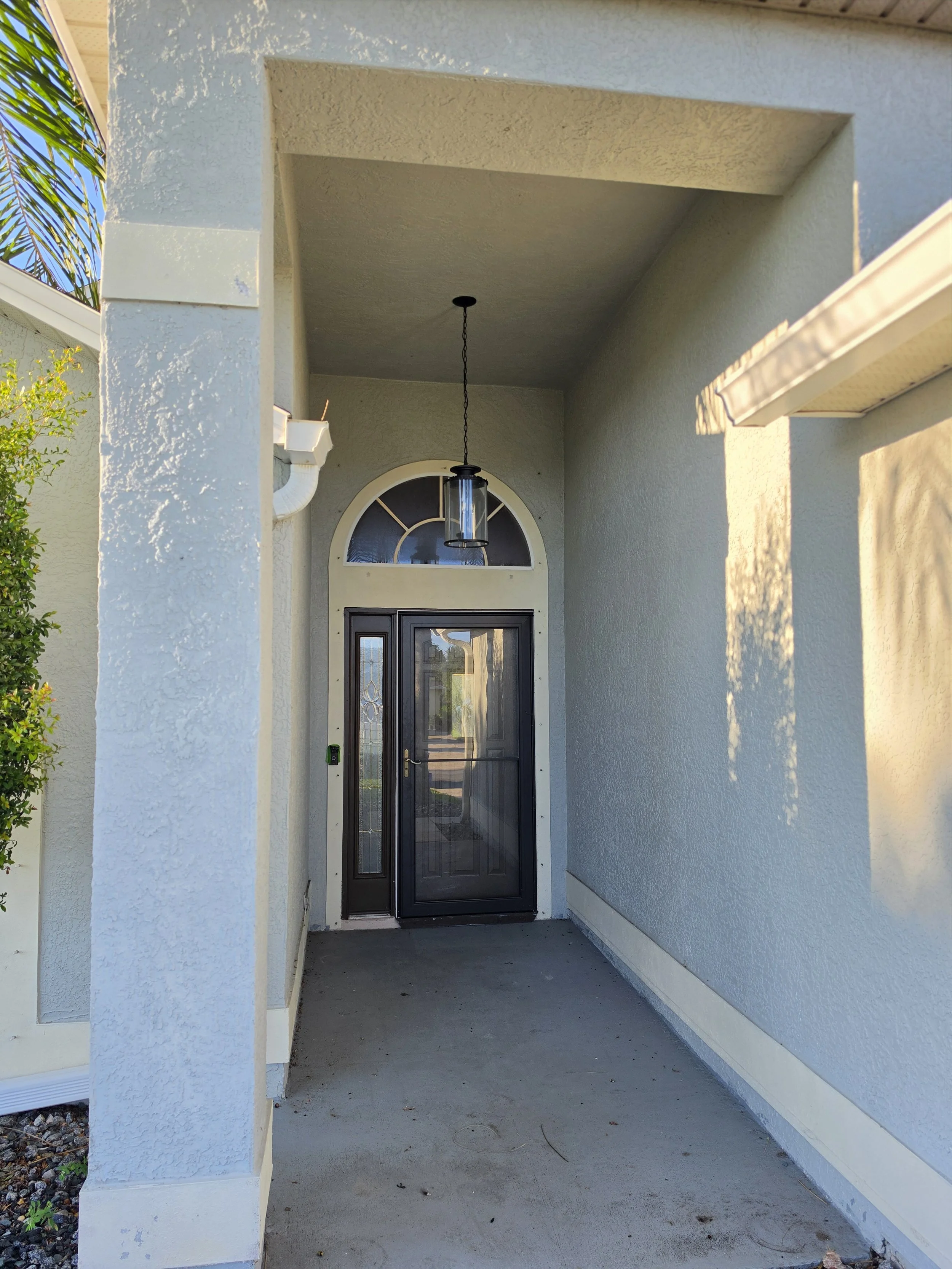 Melbourne Florida porch before soft washing by Station 321 Pressure & Soft Wash