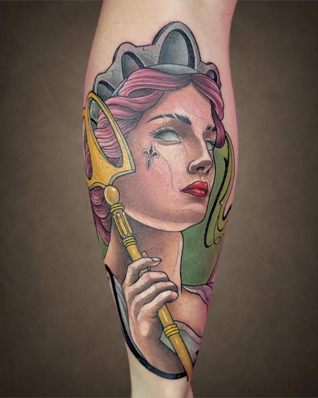 Color Neo-Traditional woman portrait tattoo with pink hair and an ornate staff, tattooed on the arm.