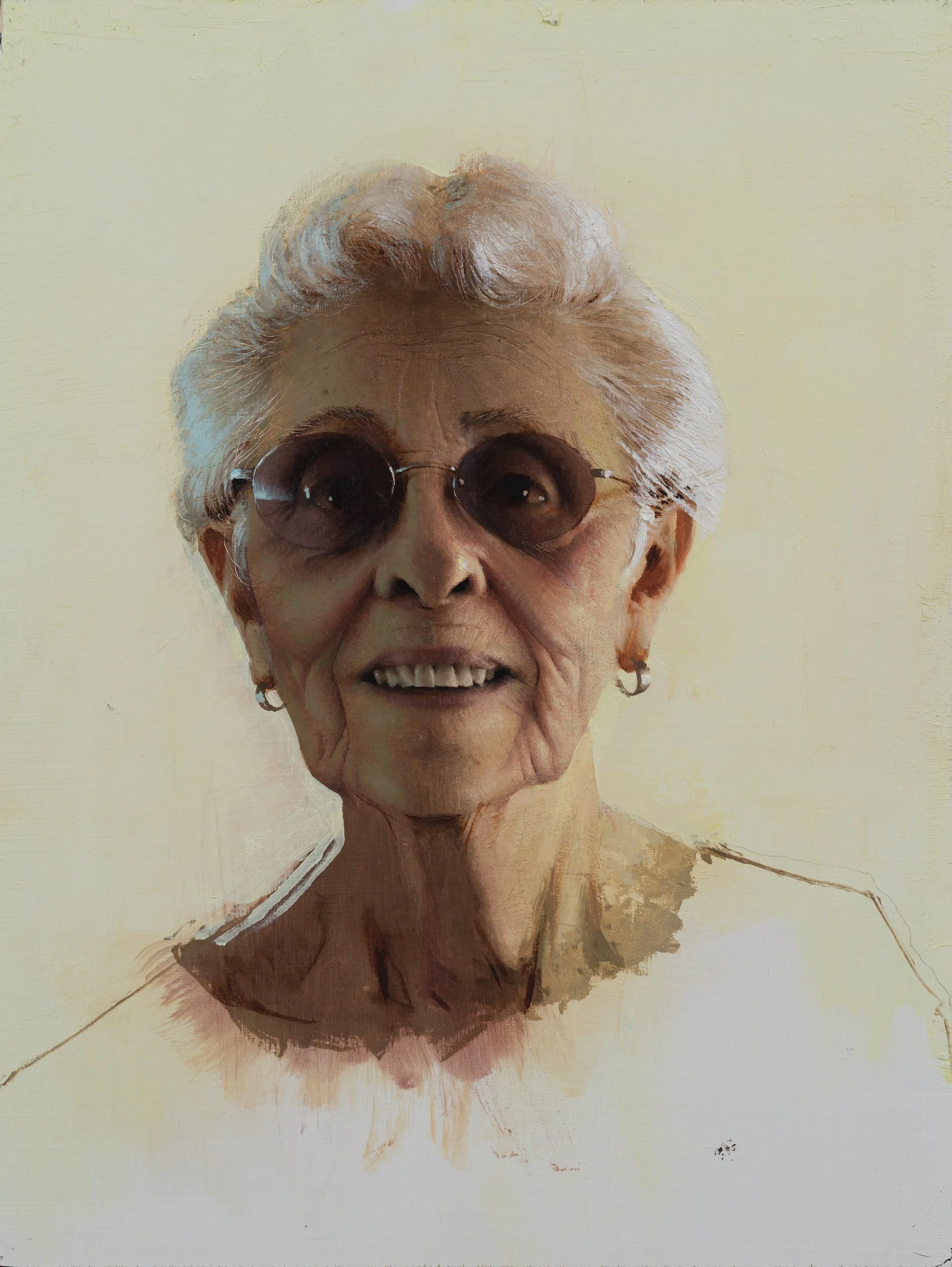 Mary Sprick by Daniel Sprick. Portrait painting of an elderly woman with short, gray hair, wearing round, dark sunglasses, smiling slightly, against a plain background.