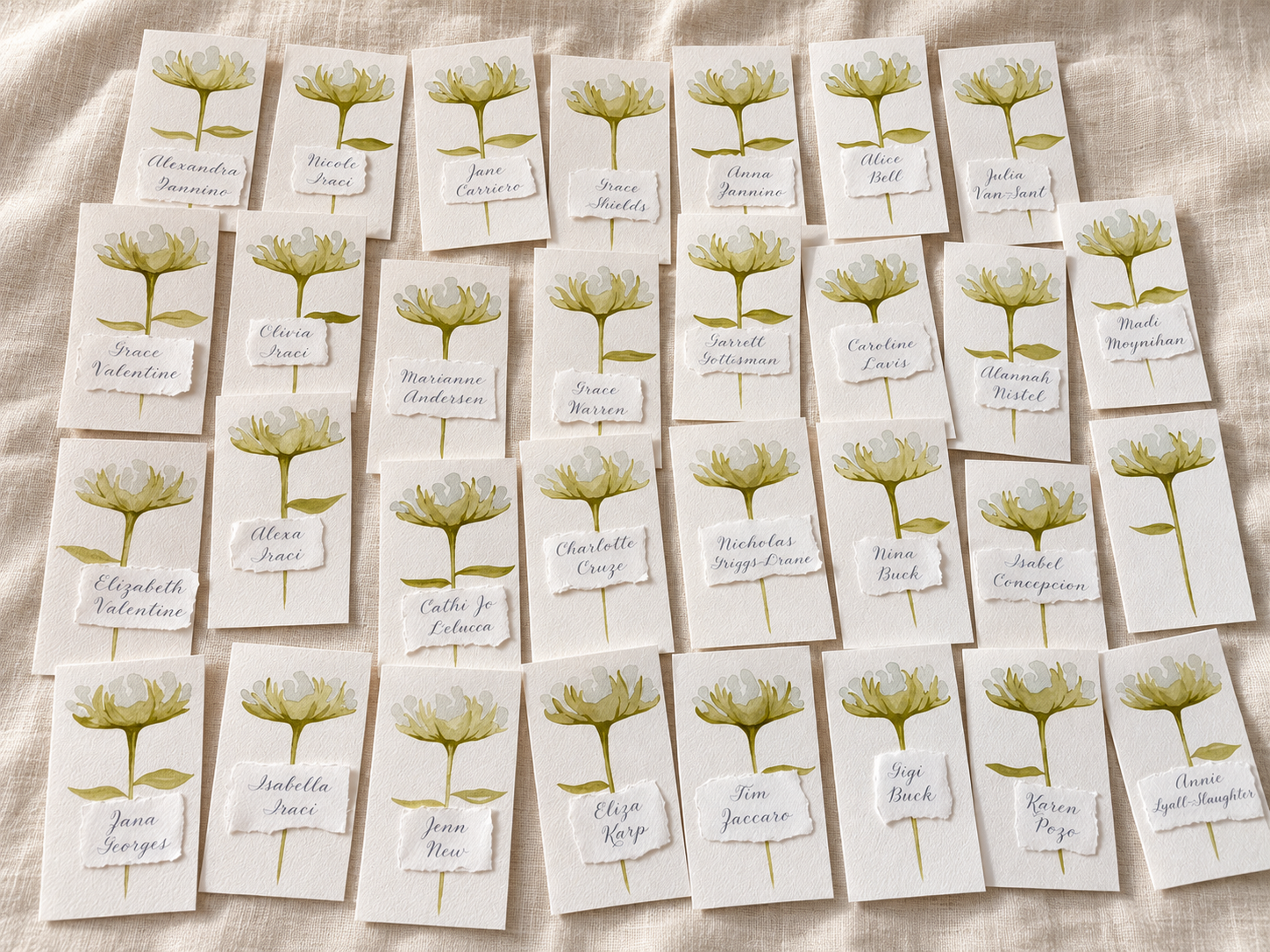 Hand-painted floral place cards on linen-1.png