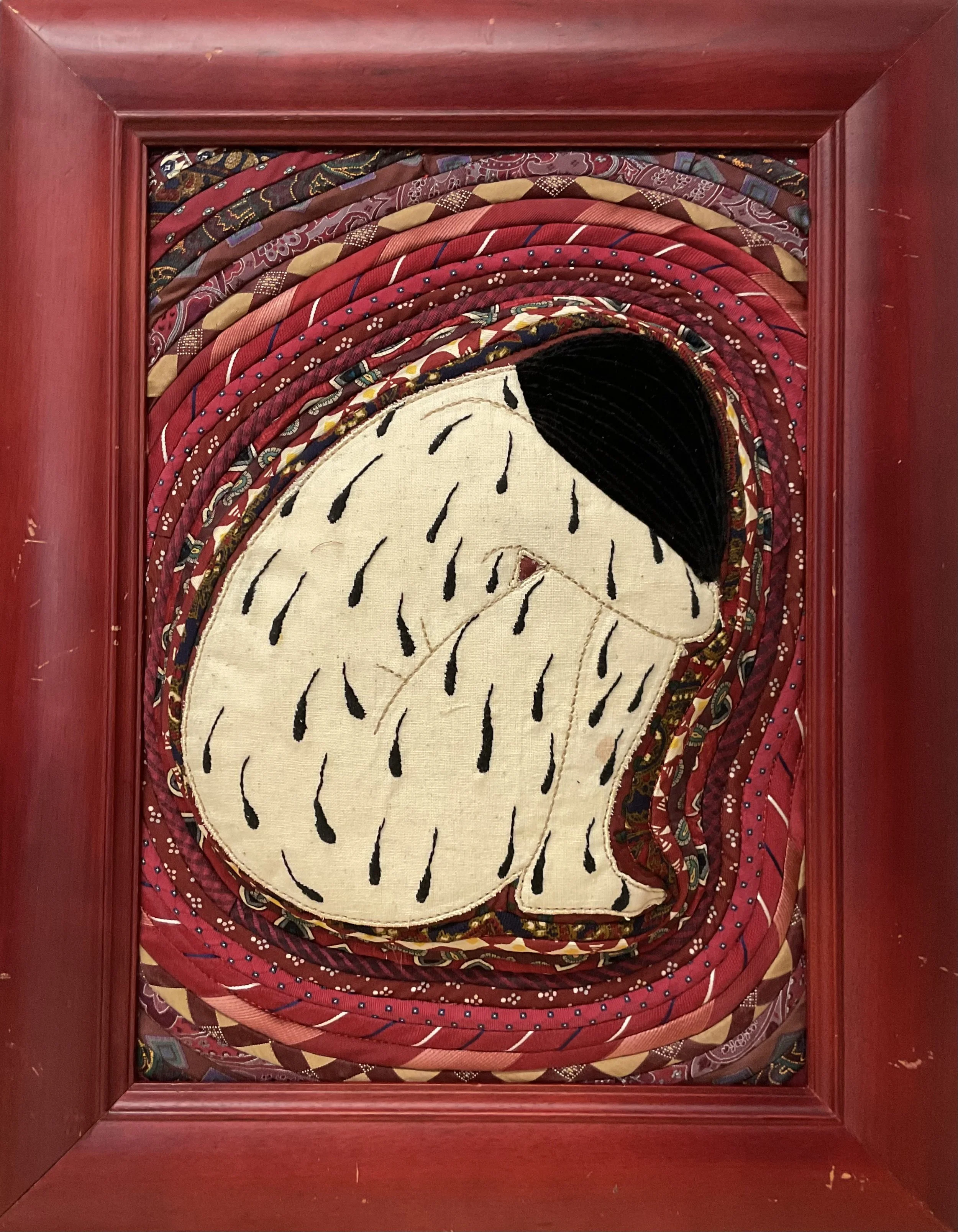"Womanhood" 2026, 18.5" x 15", Recycled fabric, embroidery floss, polyfill on recycled frame.
