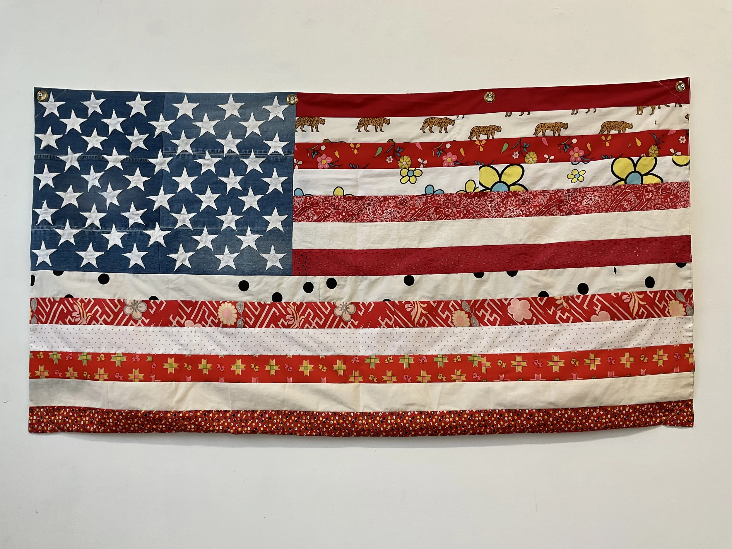 "We Are Fabric of The America" 2026, 61" X 33", Recycled fabric.