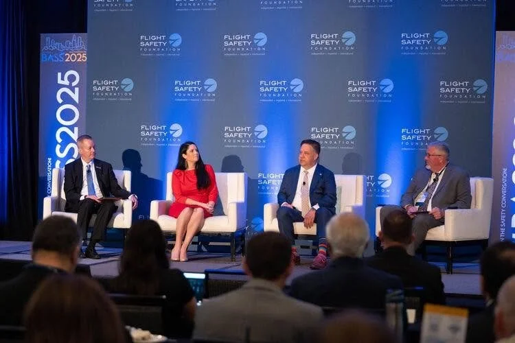 Jenny Ann Urban speaking on a safety communications panel at the Flight Safety Foundation Business Aviation Safety Symposium.