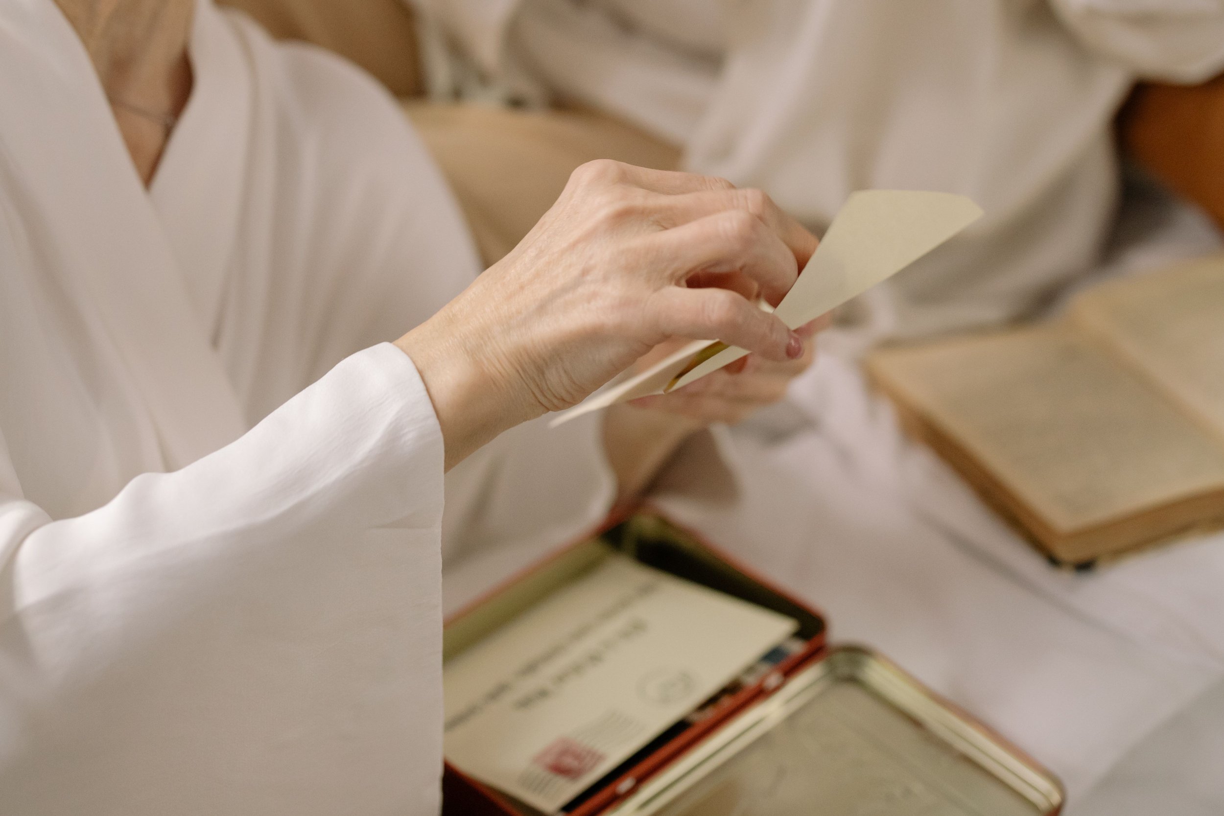Picture of a woman holding a letter