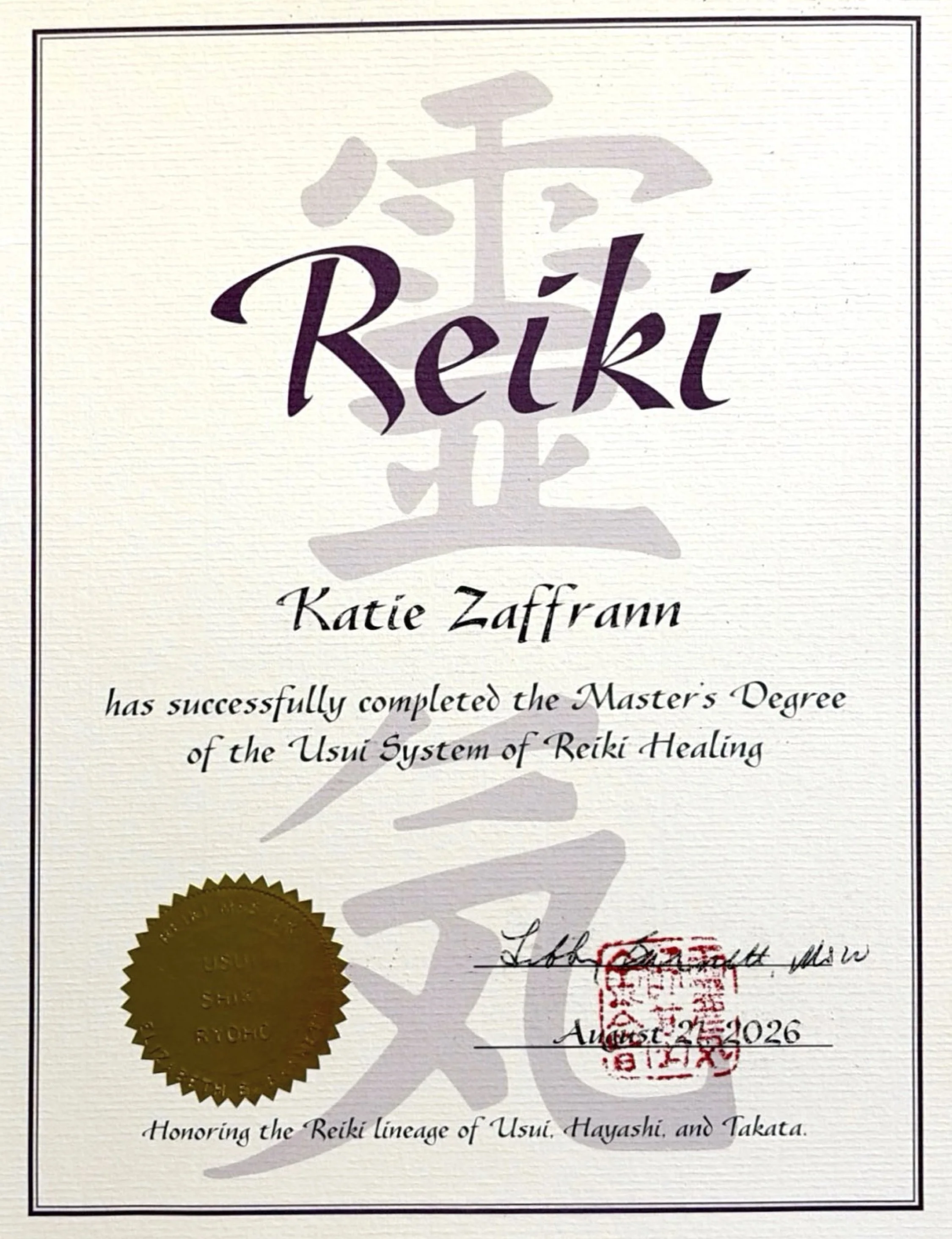 Certificate stating Katie Zaffrann has successfully completed the Master's Degree of the Usui System of Reiki Healing, signed by Libby Barnett with gold seal and the Japanese symbols for Rei and Ki
