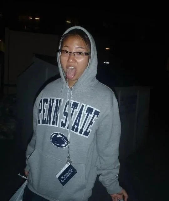 Jiggy Yoon wearing a Penn State sweatshirt during her college years