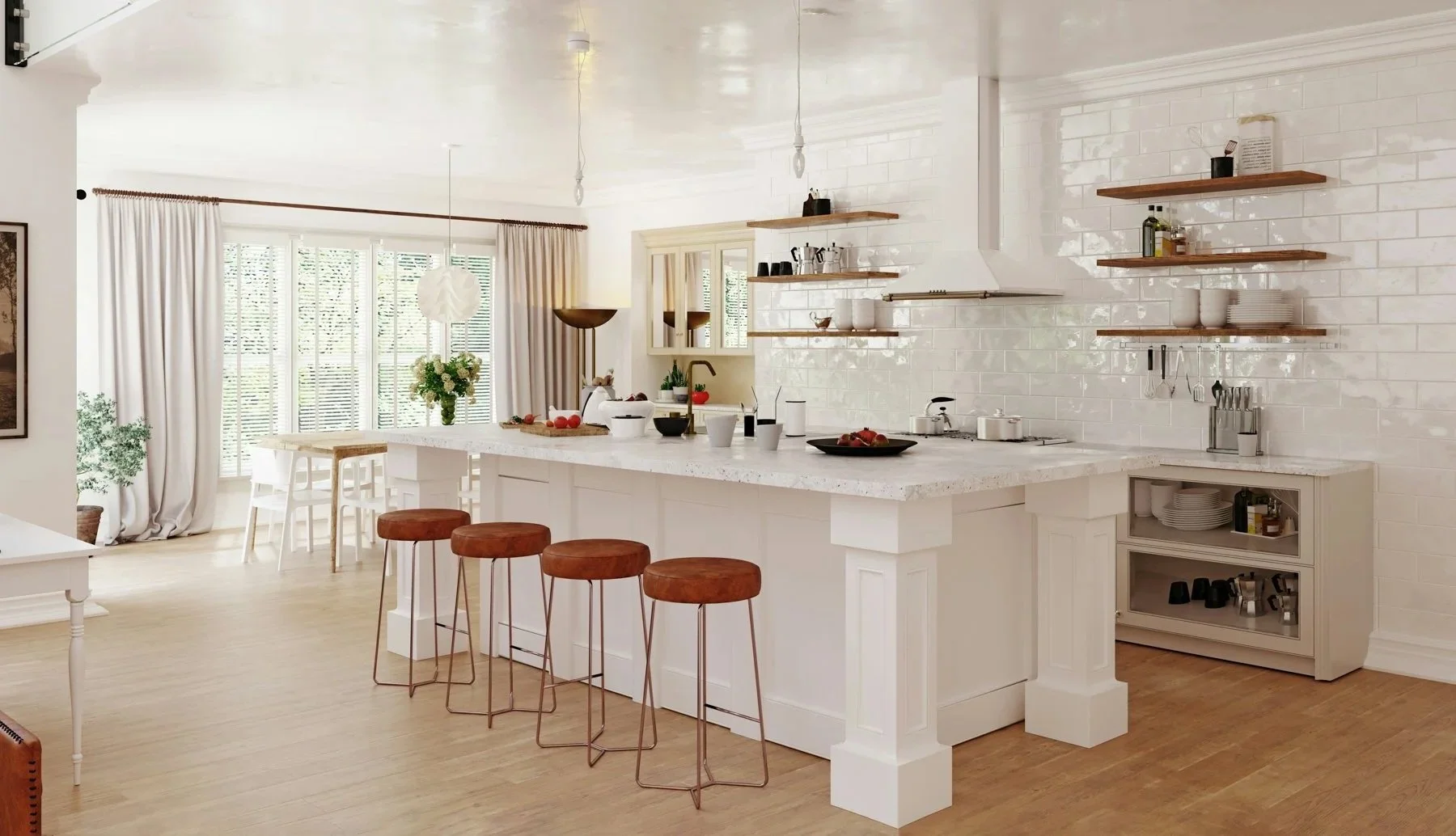 A bright, modern kitchen with white cabinetry, a large white kitchen island with four brown bar stools, and open wooden shelves holding dishes, bowls, and cooking supplies. There is a white tiled backsplash and a window with white blinds and curtains, natural light fills the space. A kitchen table with white chairs and a floral centerpiece is in the background.