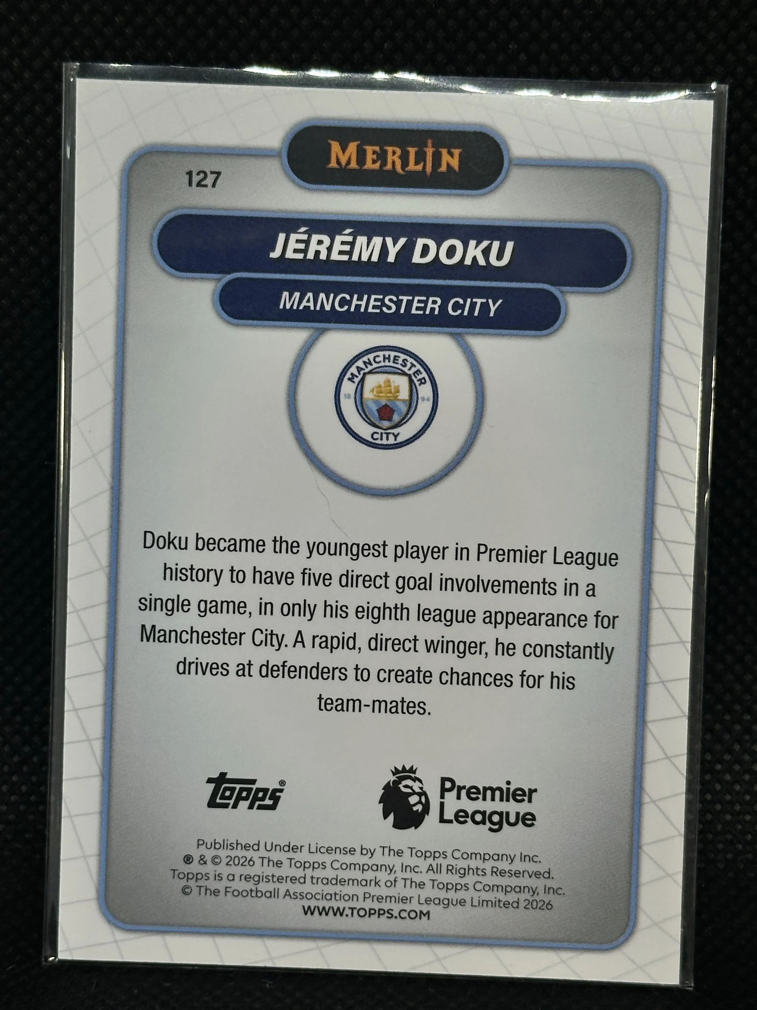 Back of 2025-26 Topps Merlin Premier League Jérémy Doku card #127.