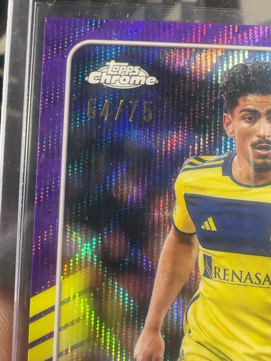 Detail of Ahmed Qasem Purple Refractor autograph card showing the approved serial and condition area.