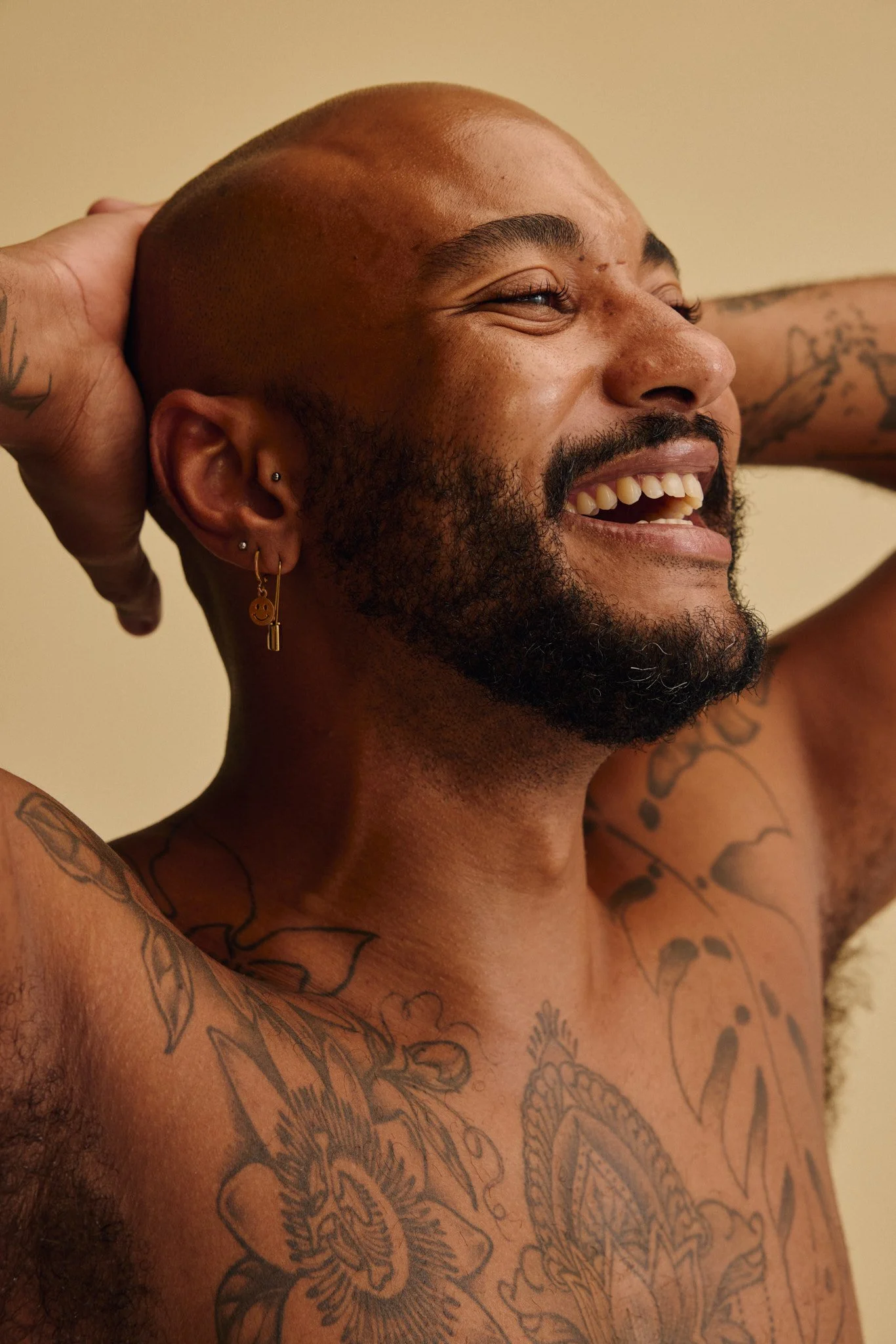 Close-up portrait of a man laughing during movement class