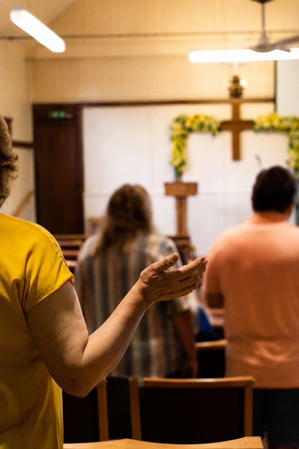 Members of Emmanuel Fellowship gathering together at church.
