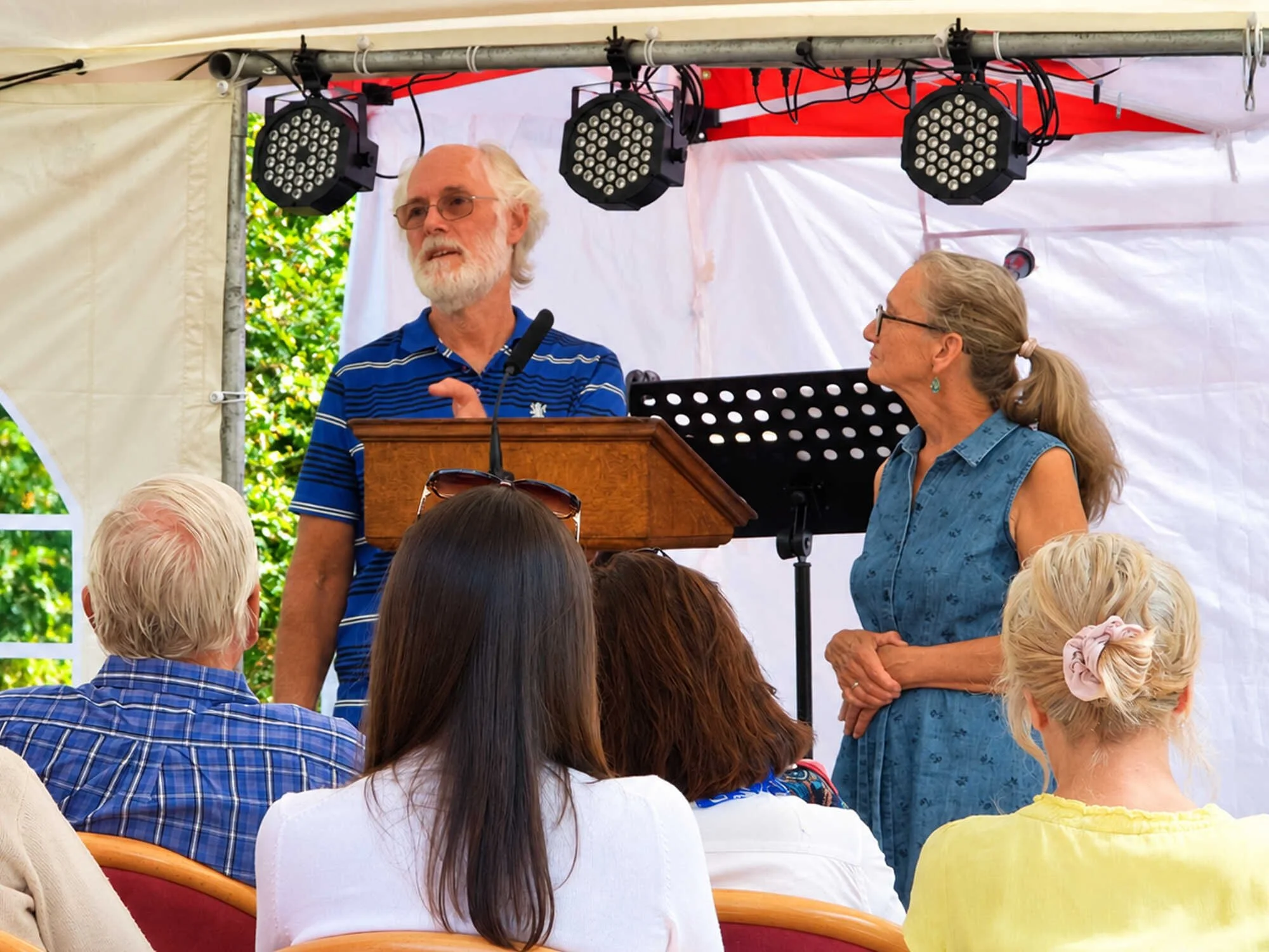 Emmanuel Fellowship member giving a message at an outdoor service