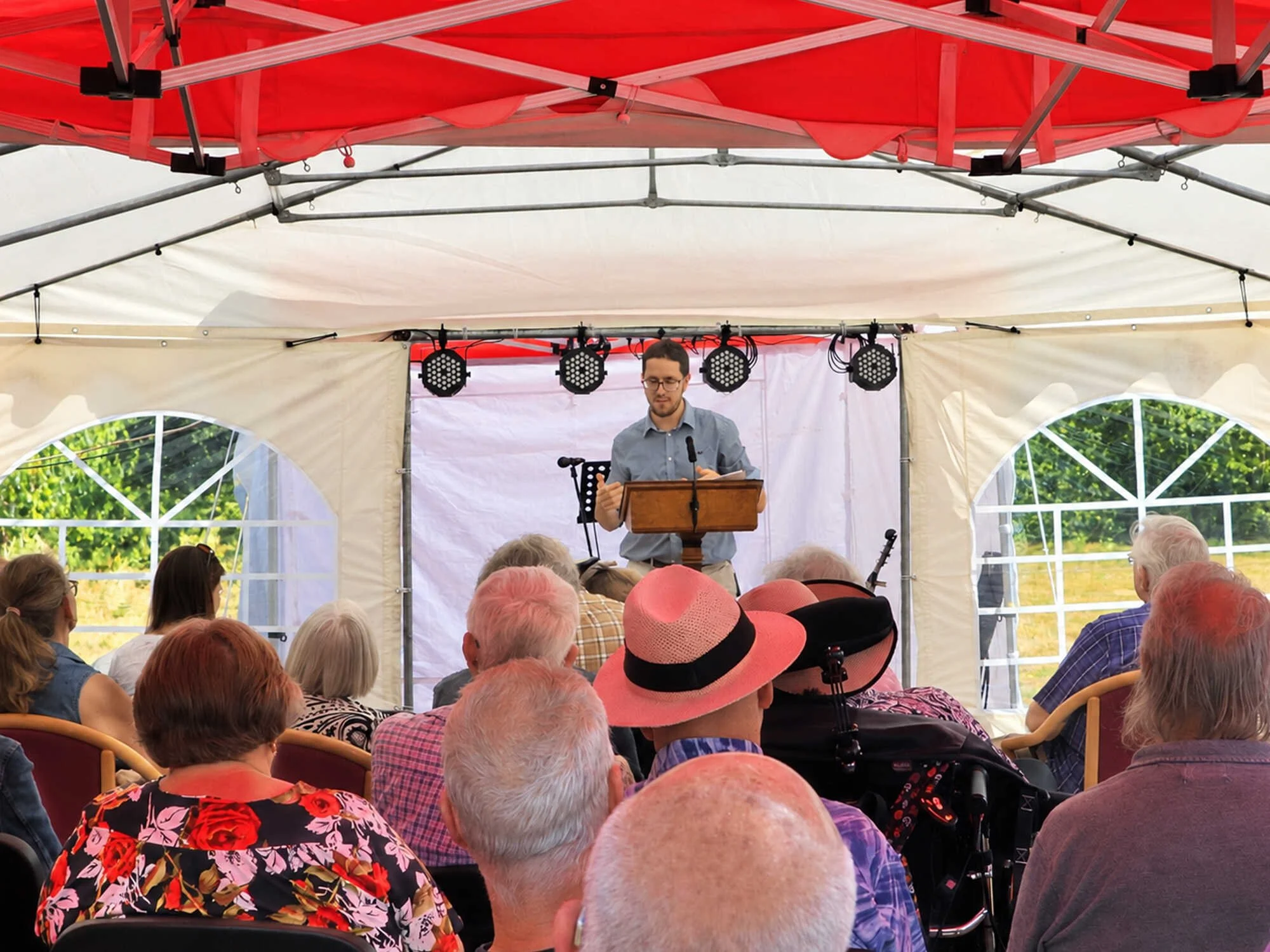 Members of Emmanuel Fellowship leading a service at an outdoor gathering