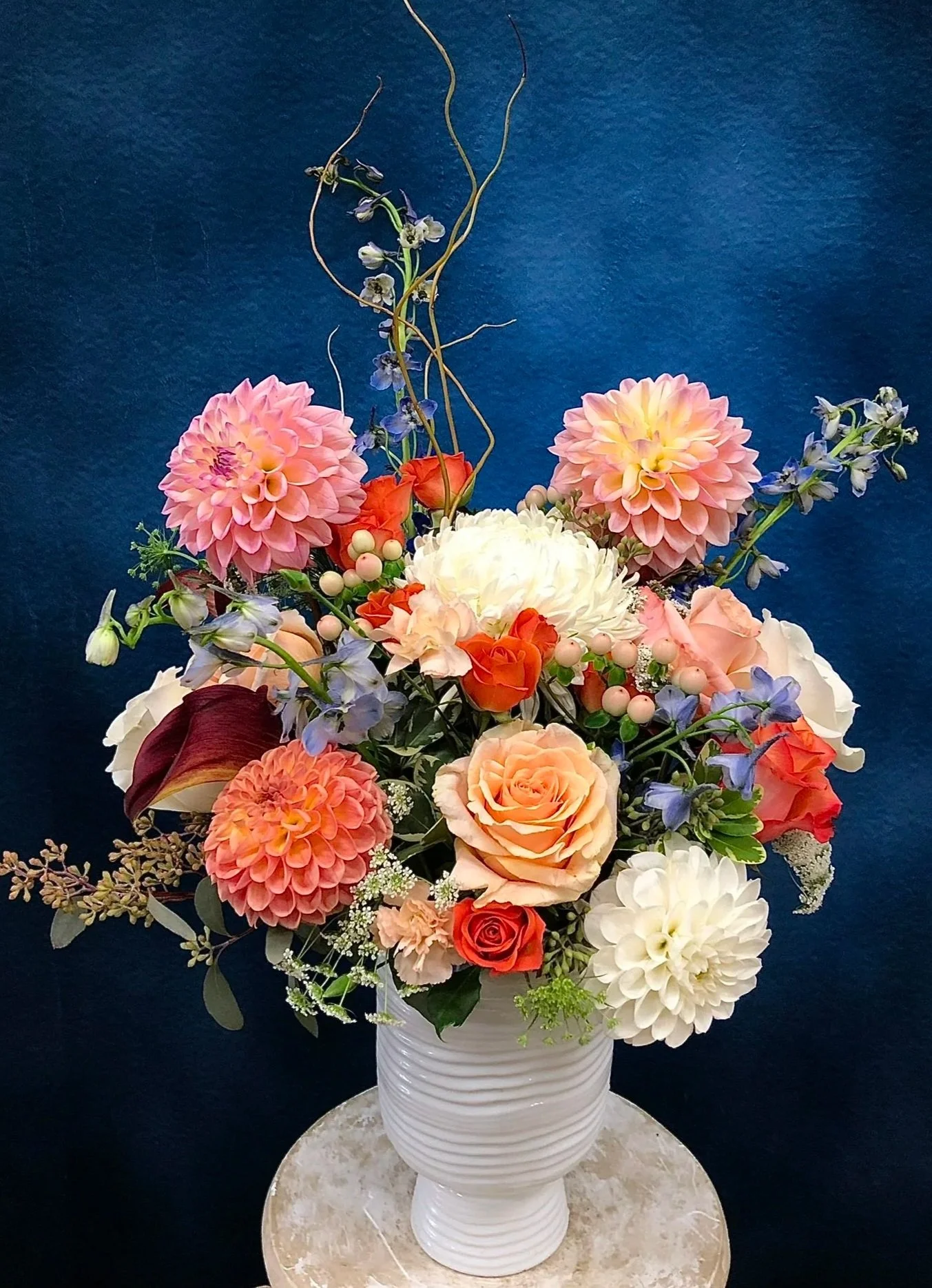 Tropical floral design featuring bold and vibrant colors for $200.