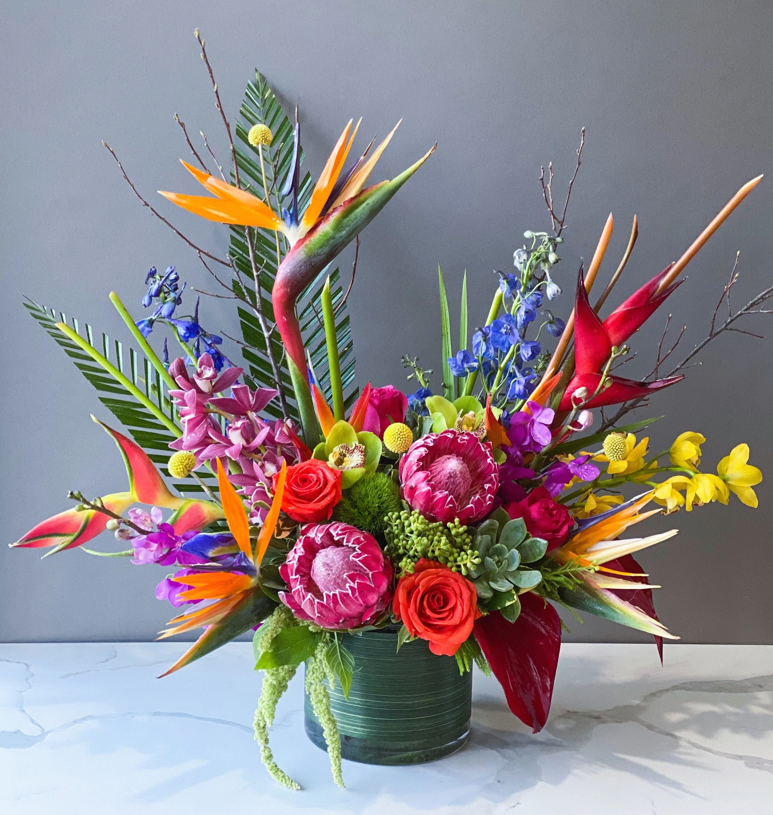 Tropical floral design featuring bold and vibrant colors for $200.