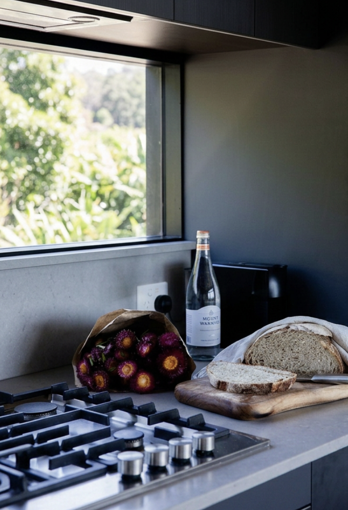 Kitchen prepared for guest arrival at a Byron Bay holiday property.