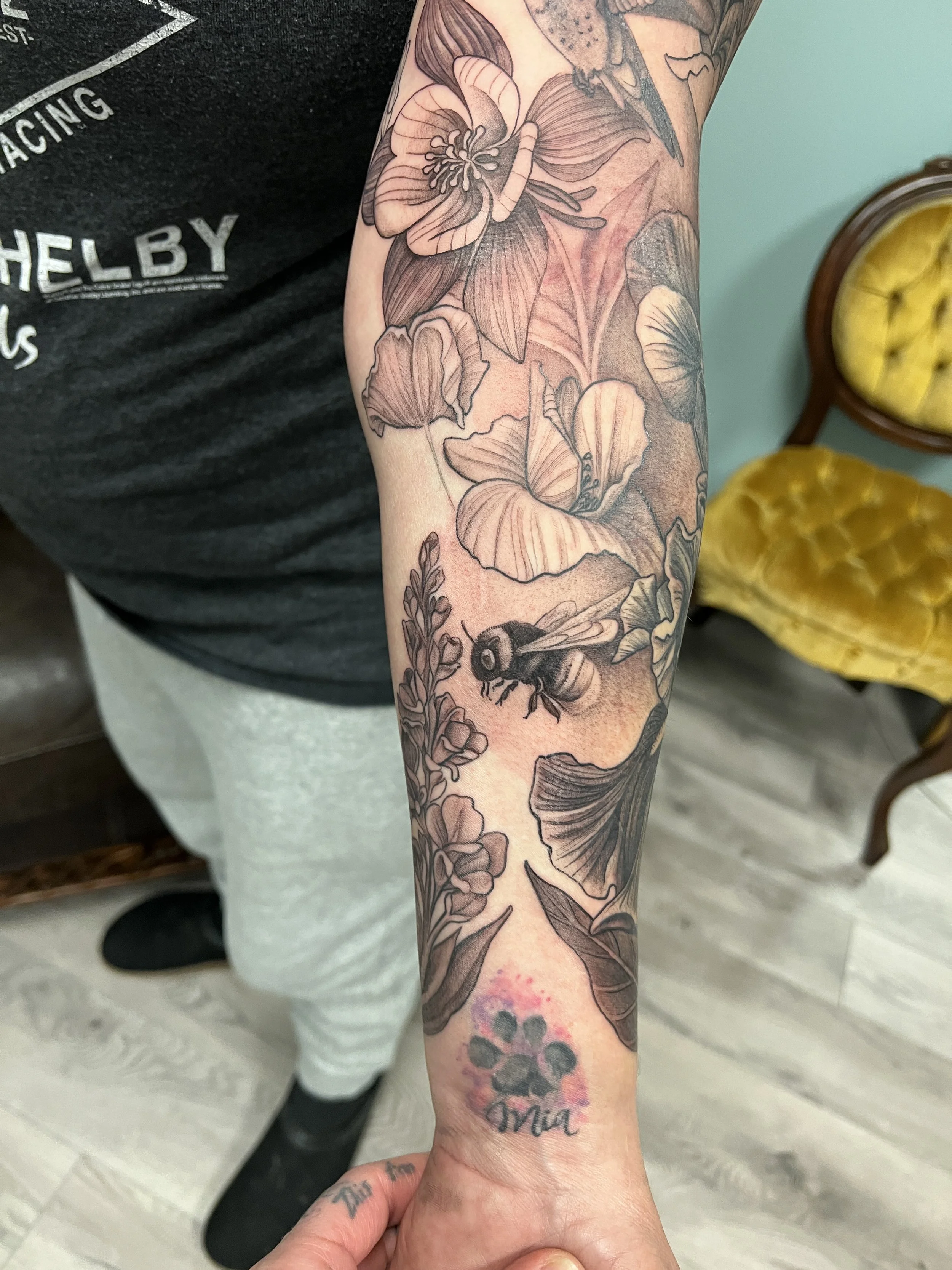 Black and grey floral with a bumble bee 