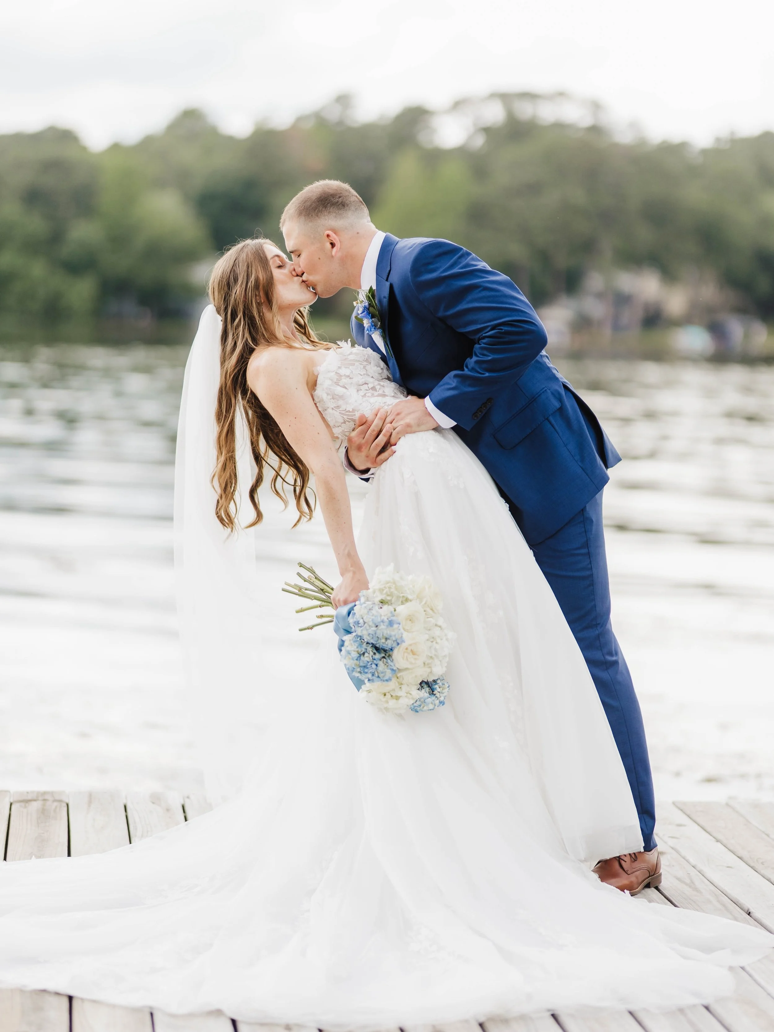I&rsquo;ll take a wedding by the lake every time 💙 
.
.
.
.
Planning, Design and Florals @trinitynielsenevents 
Boutonni&egrave;res @lindalefloralshop 
Dress @elevatedbridal