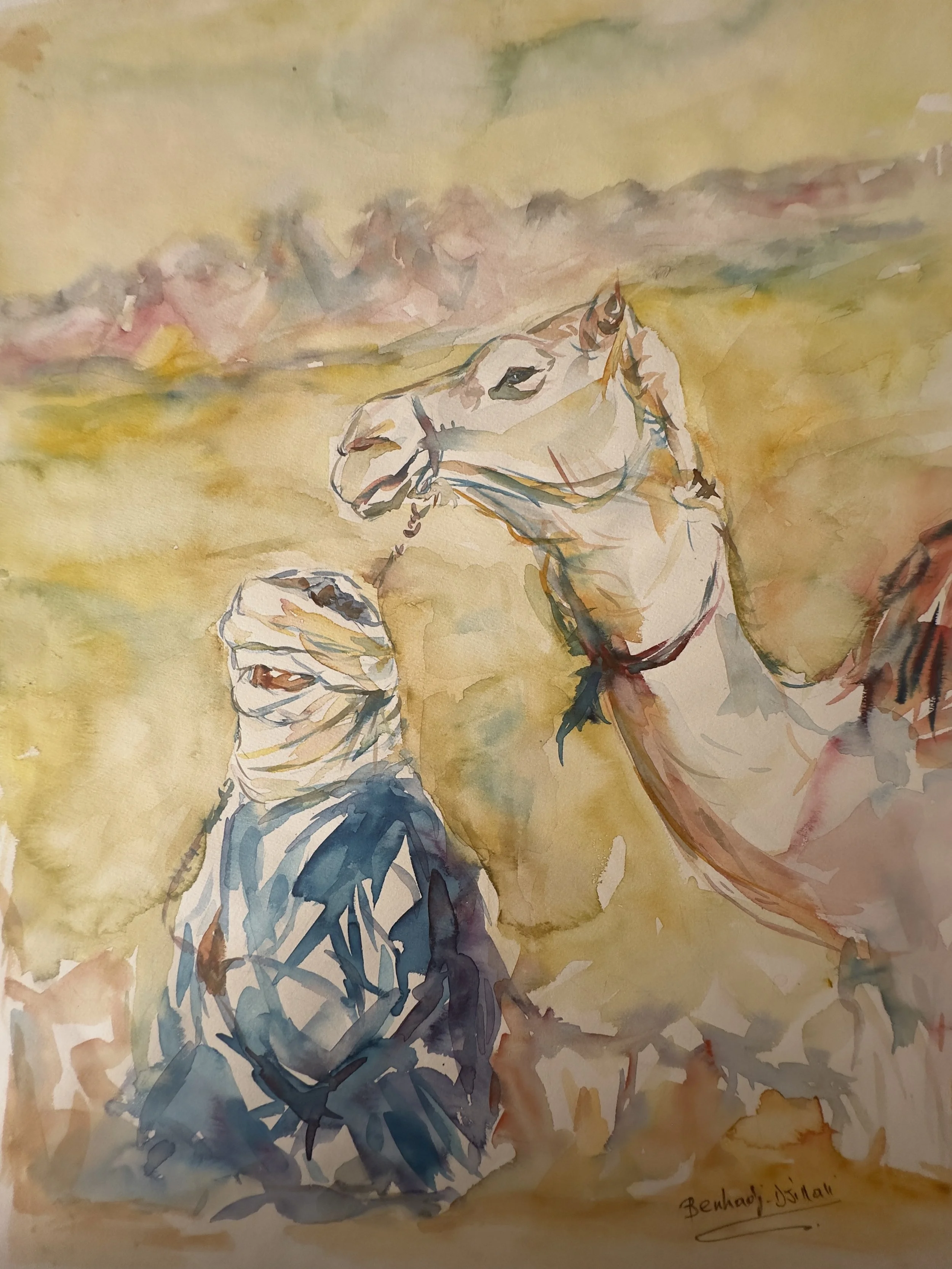 A watercolor painting of two horses, one light-colored and the other darker, with a colorful, abstract background. The artist's signature, 'Behna Dijmall,' is visible in the bottom right corner.