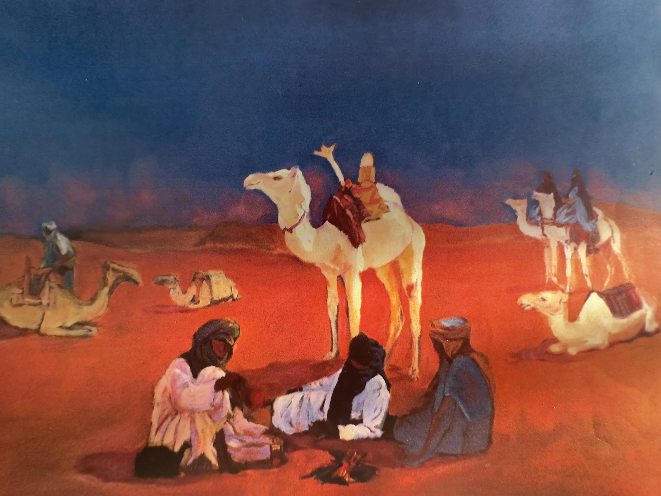 Painting depicting a desert scene with camels and people, featuring a dark sky with stars and reddish terrain.