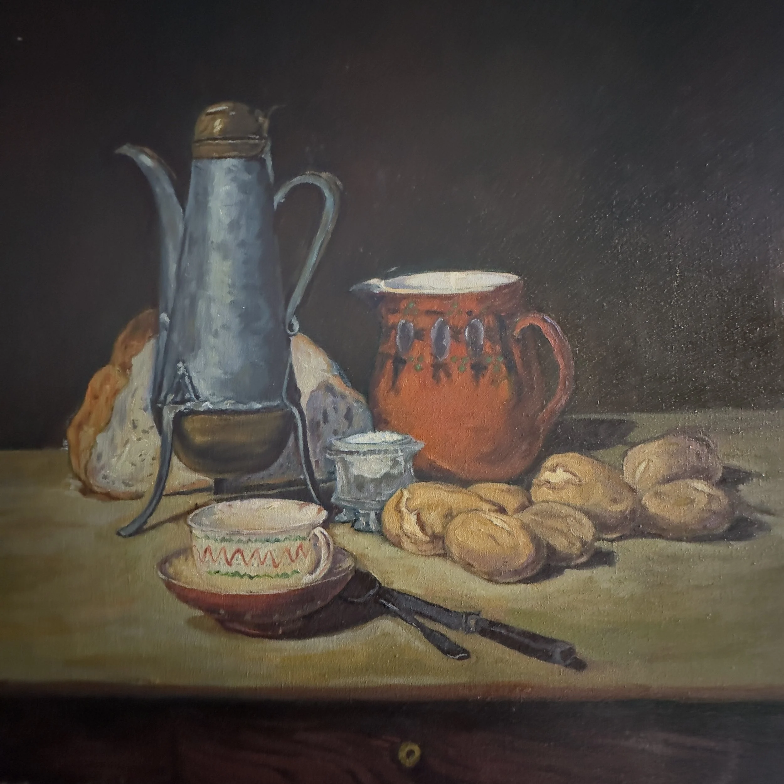 A still life painting featuring a metal teapot with a wooden handle, a chipped glass cup with a floral pattern, an orange ceramic cup, and scattered cookies on a surface against a dark background.