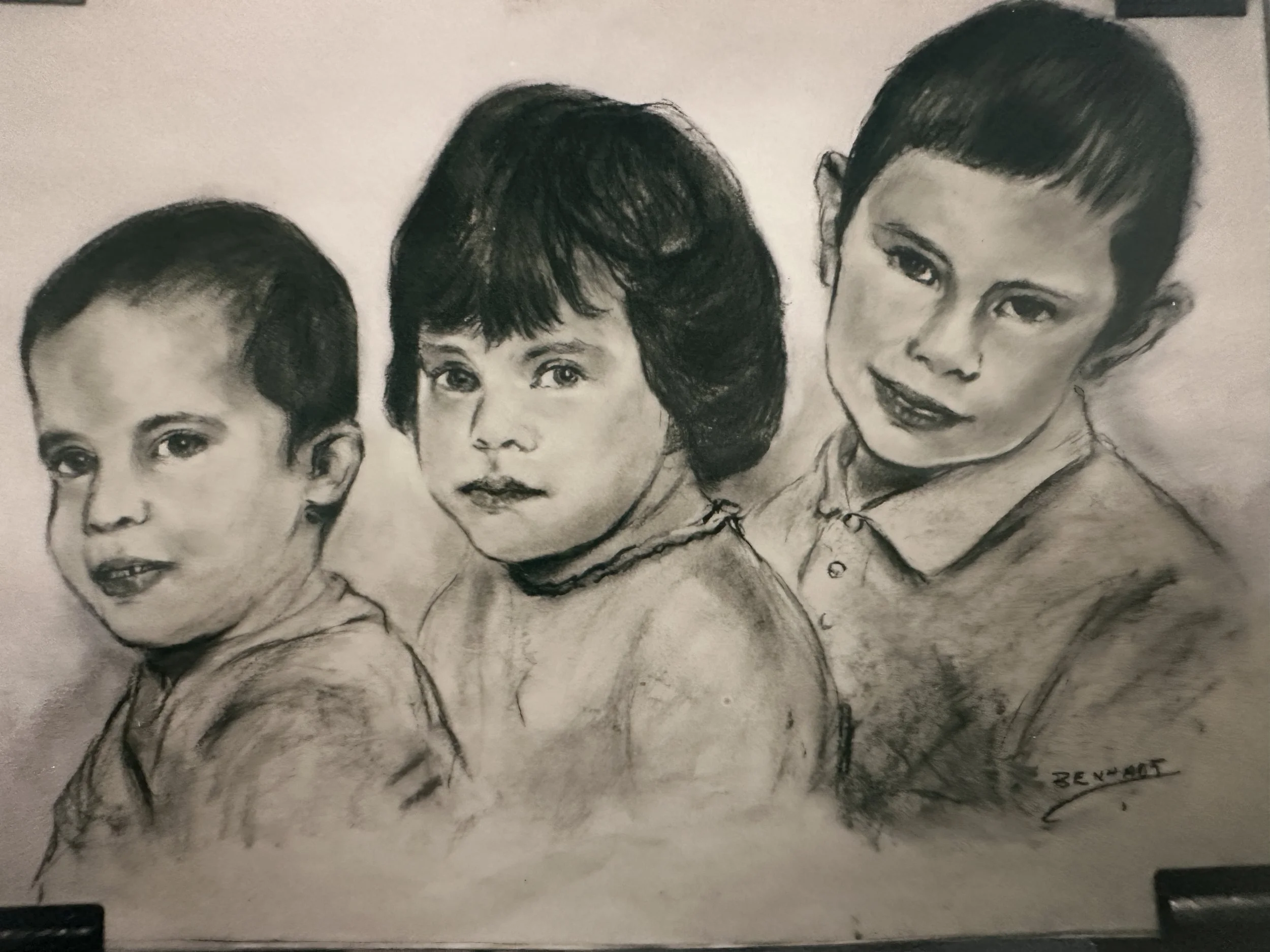 Portrayal of three children in black-and-white sketch style with detailed facial features. Signed by the artist, Beyout.